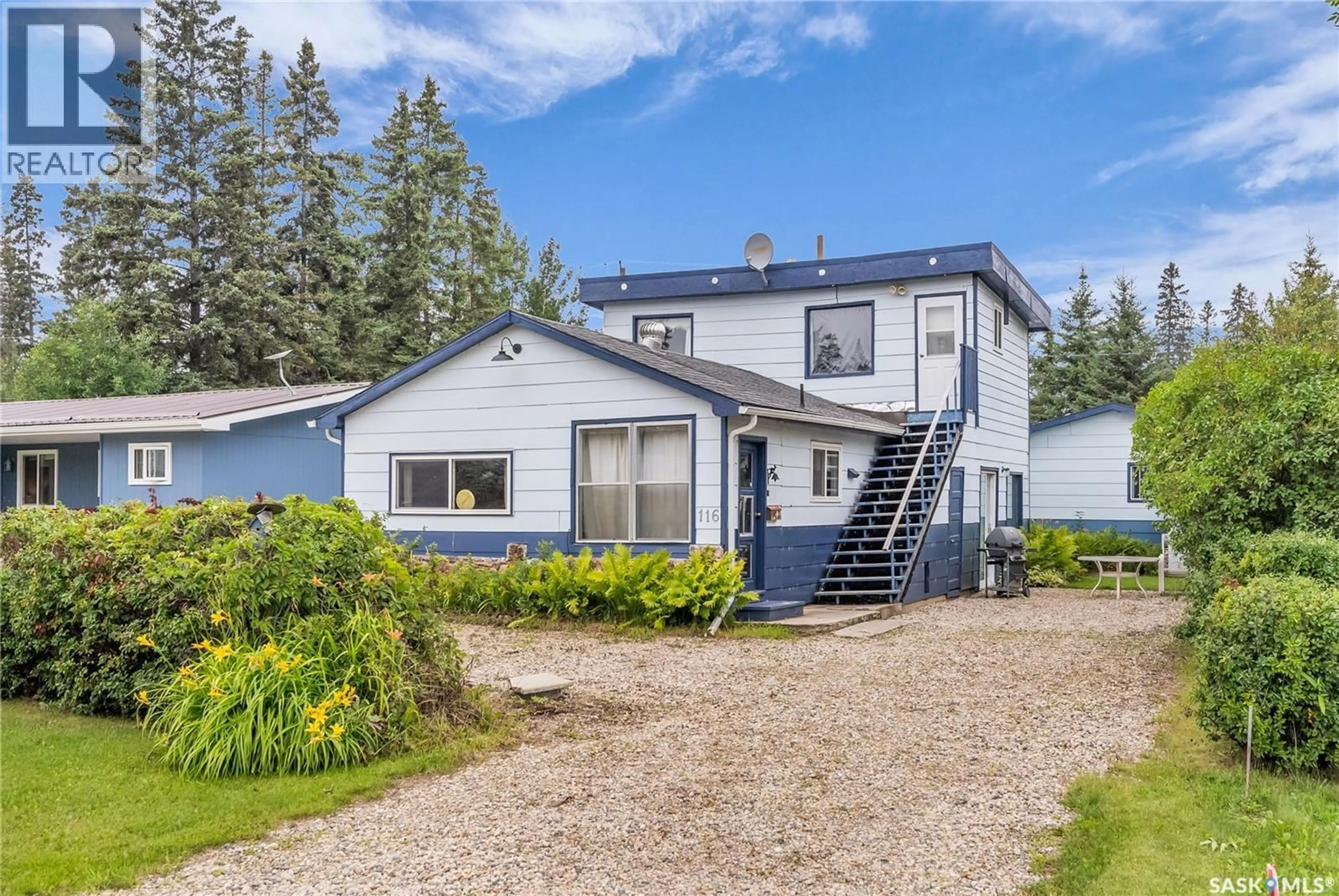 Home with vinyl exterior material, street for 116 FOSTER STREET, Lakeland Rm No. 521 Saskatchewan S0J0N0