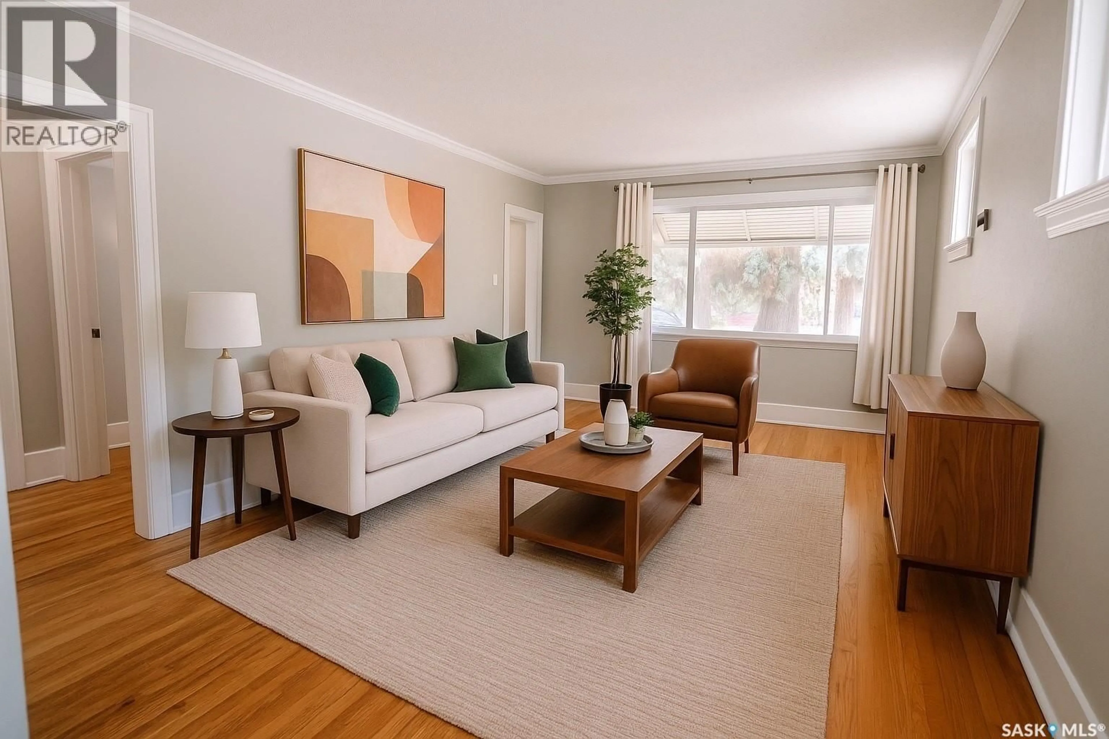 Living room with furniture, wood/laminate floor for 2154 BRODER STREET, Regina Saskatchewan S4N3S4