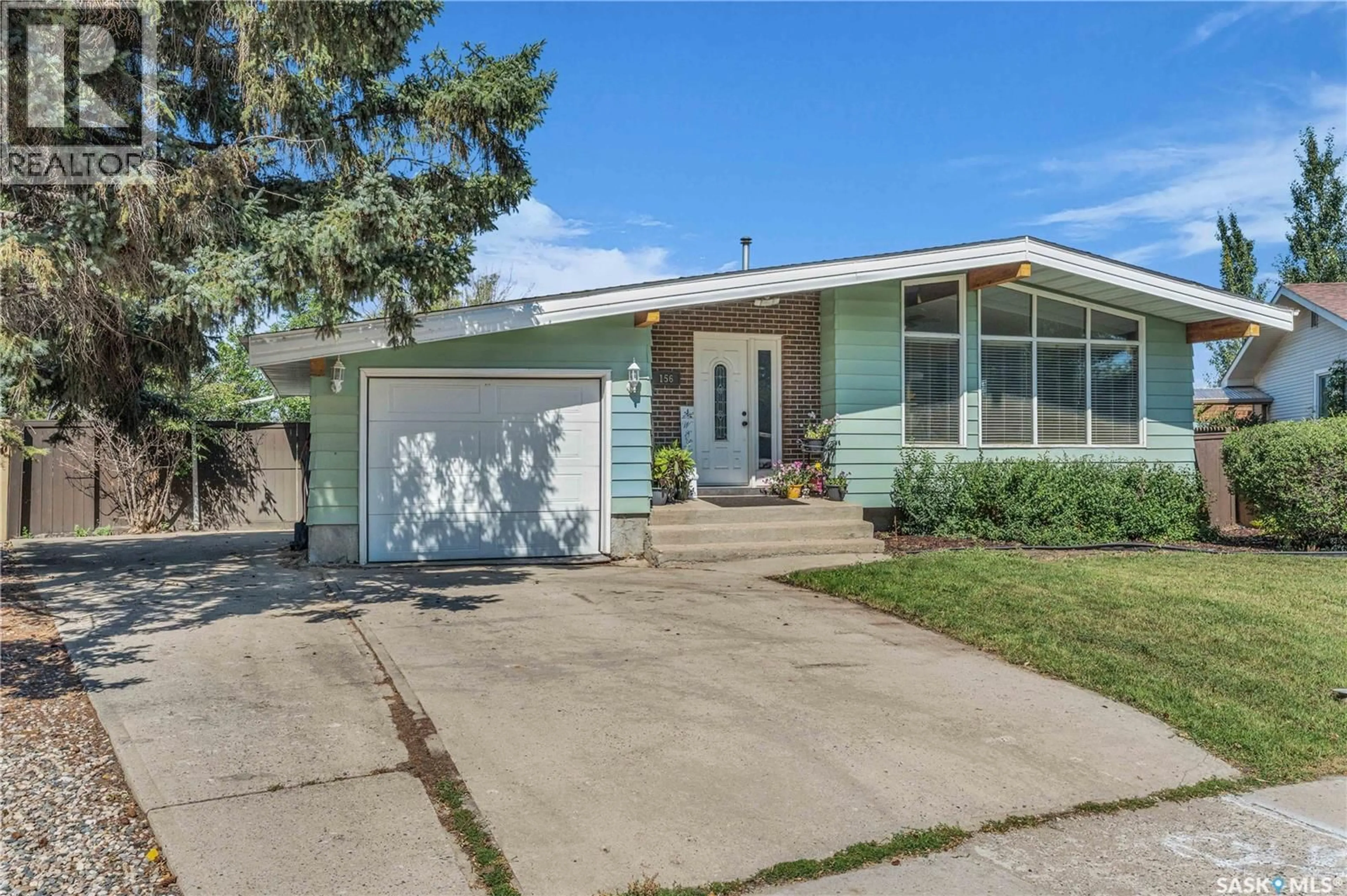 Home with vinyl exterior material, street for 156 CARMICHAEL ROAD, Regina Saskatchewan S4R6E2