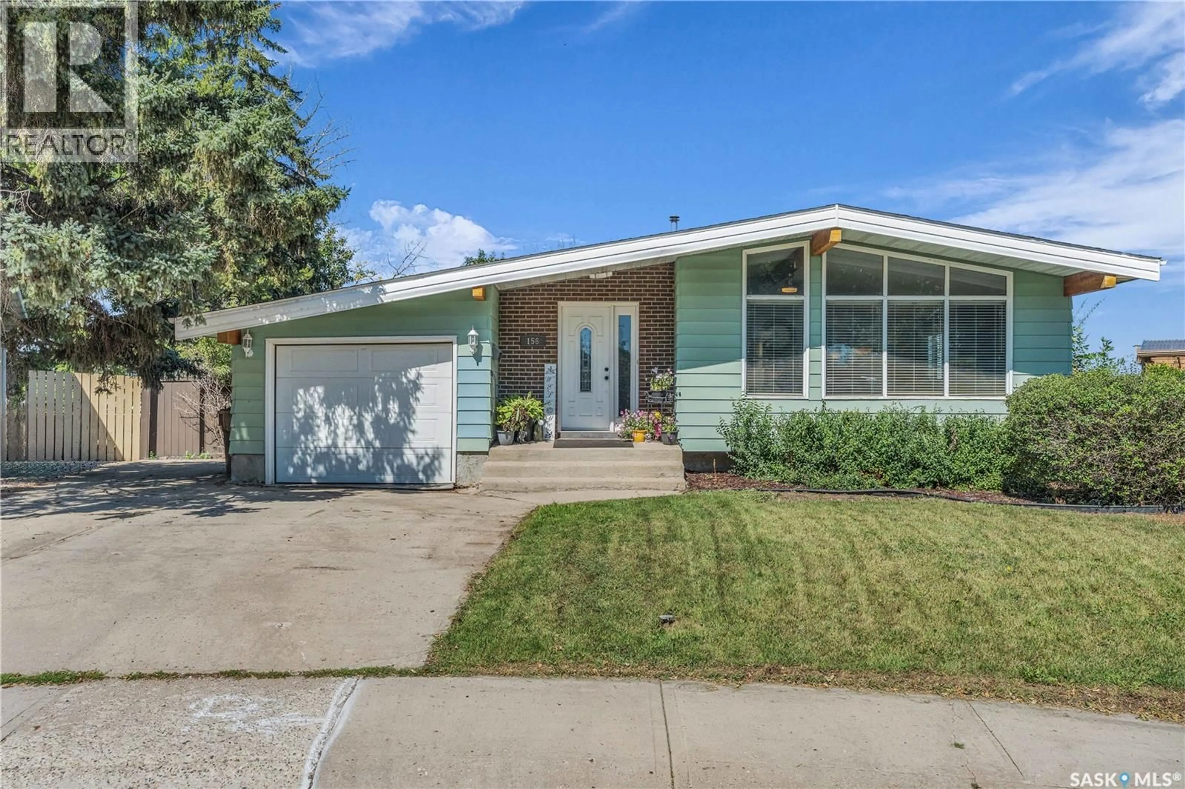 Home with vinyl exterior material, street for 156 CARMICHAEL ROAD, Regina Saskatchewan S4R6E2