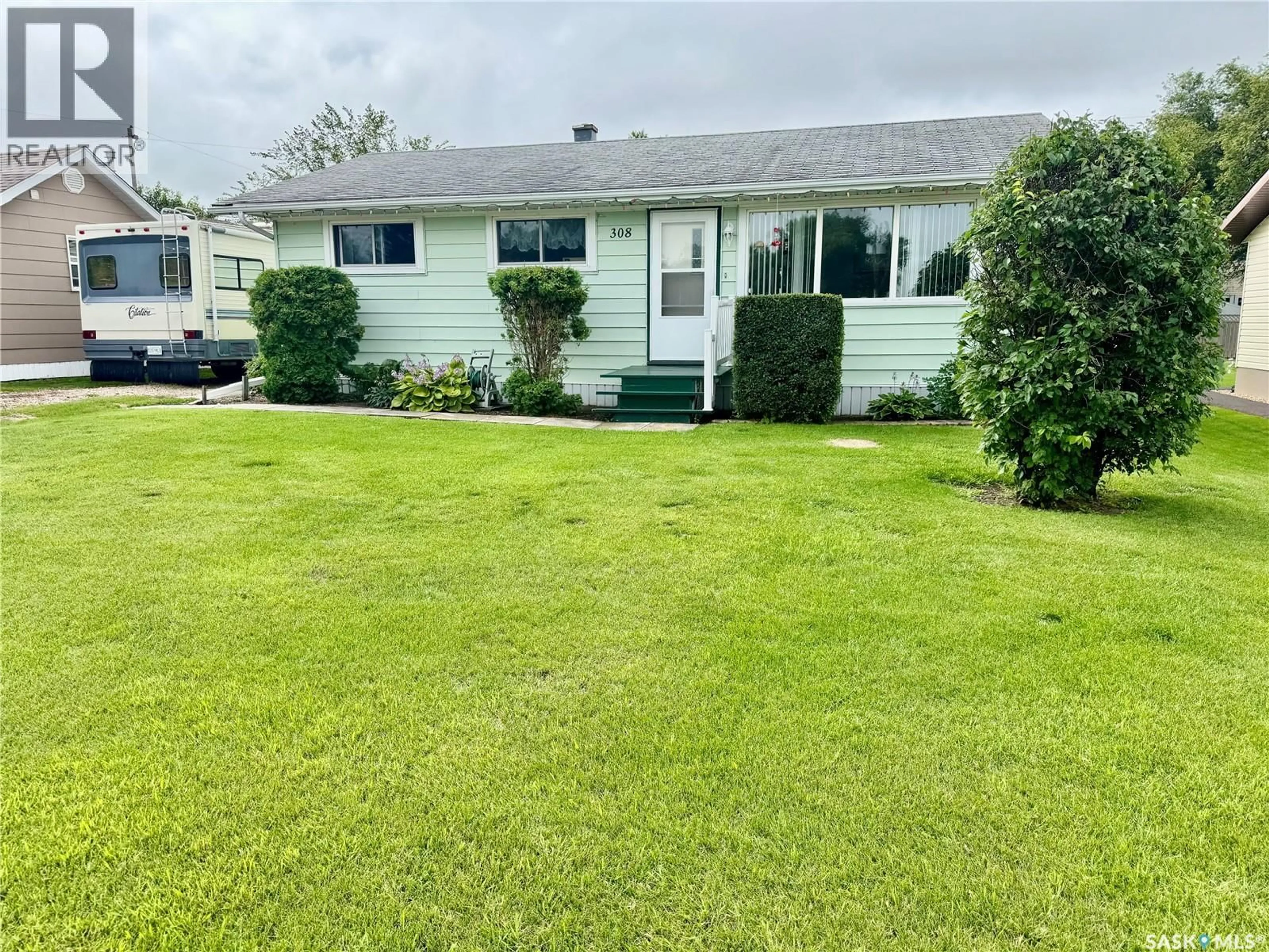 A pic from outside/outdoor area/front of a property/back of a property/a pic from drone, street for 308 SCOTT STREET, Muenster Saskatchewan S0K2Y0