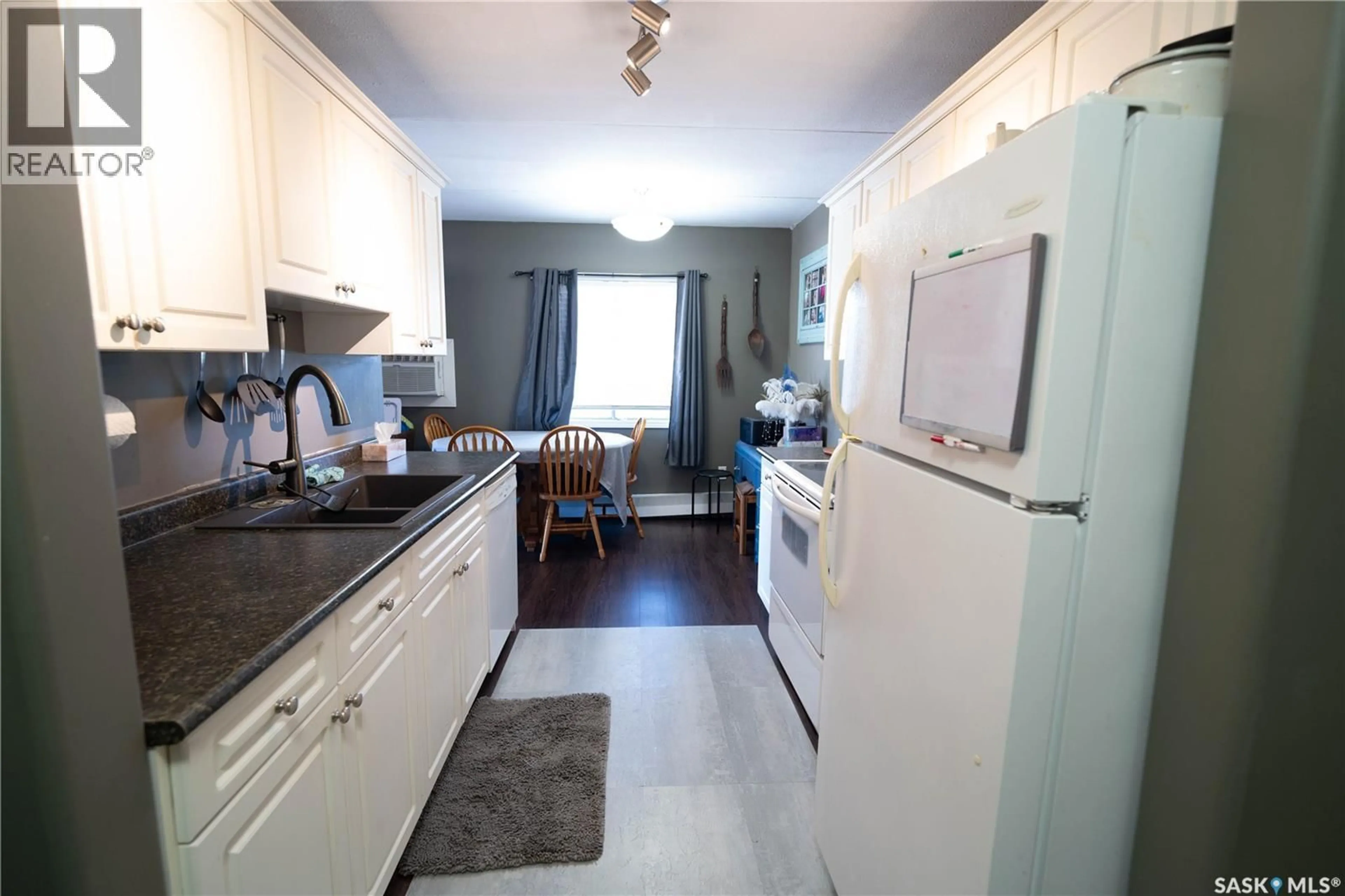 Standard kitchen, wood/laminate floor for 20 - 38 ASSINIBOINE DRIVE, Saskatoon Saskatchewan S7K1H2