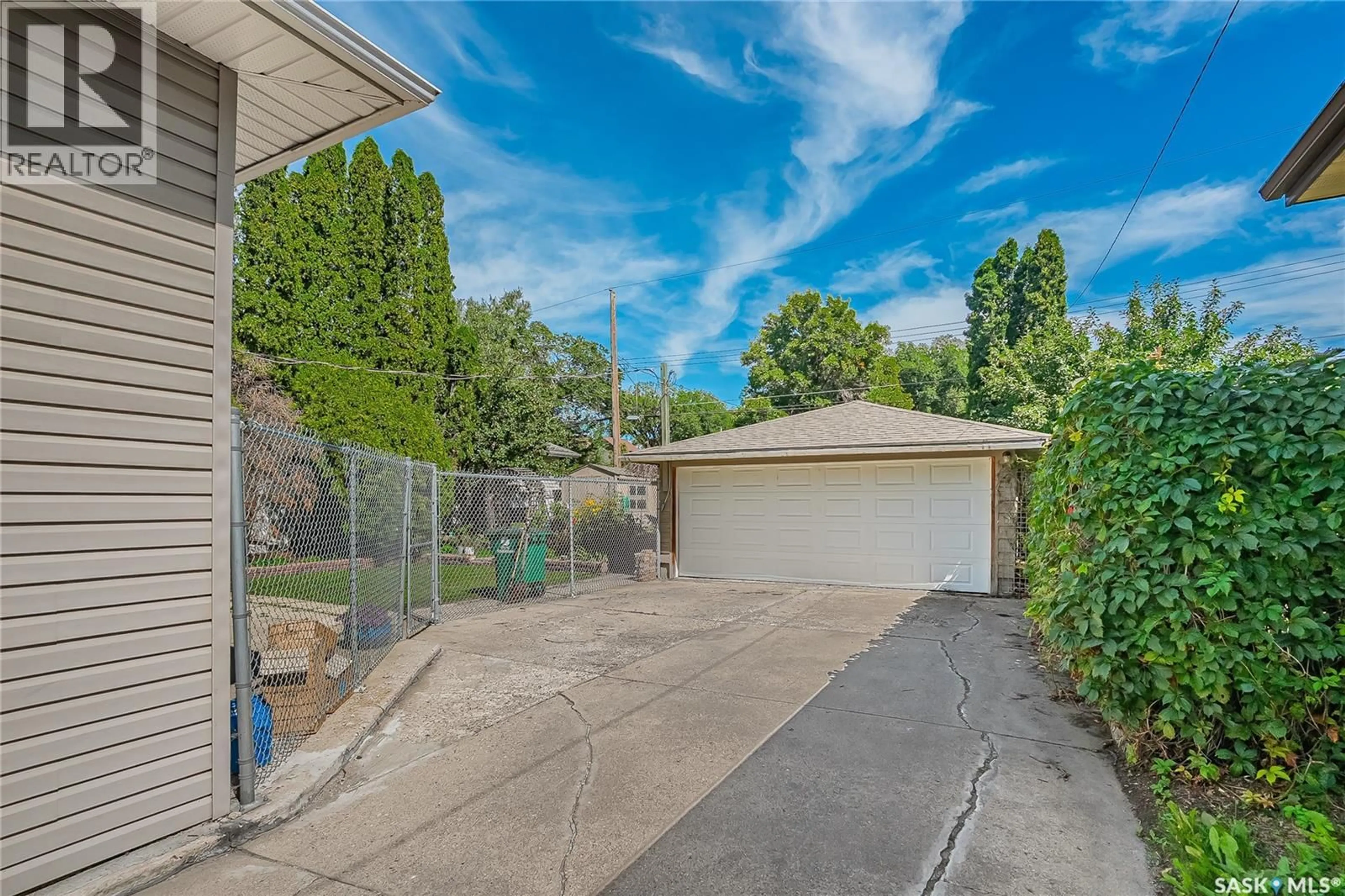 A pic from outside/outdoor area/front of a property/back of a property/a pic from drone, street for 1316 J AVENUE, Saskatoon Saskatchewan S7L2L8
