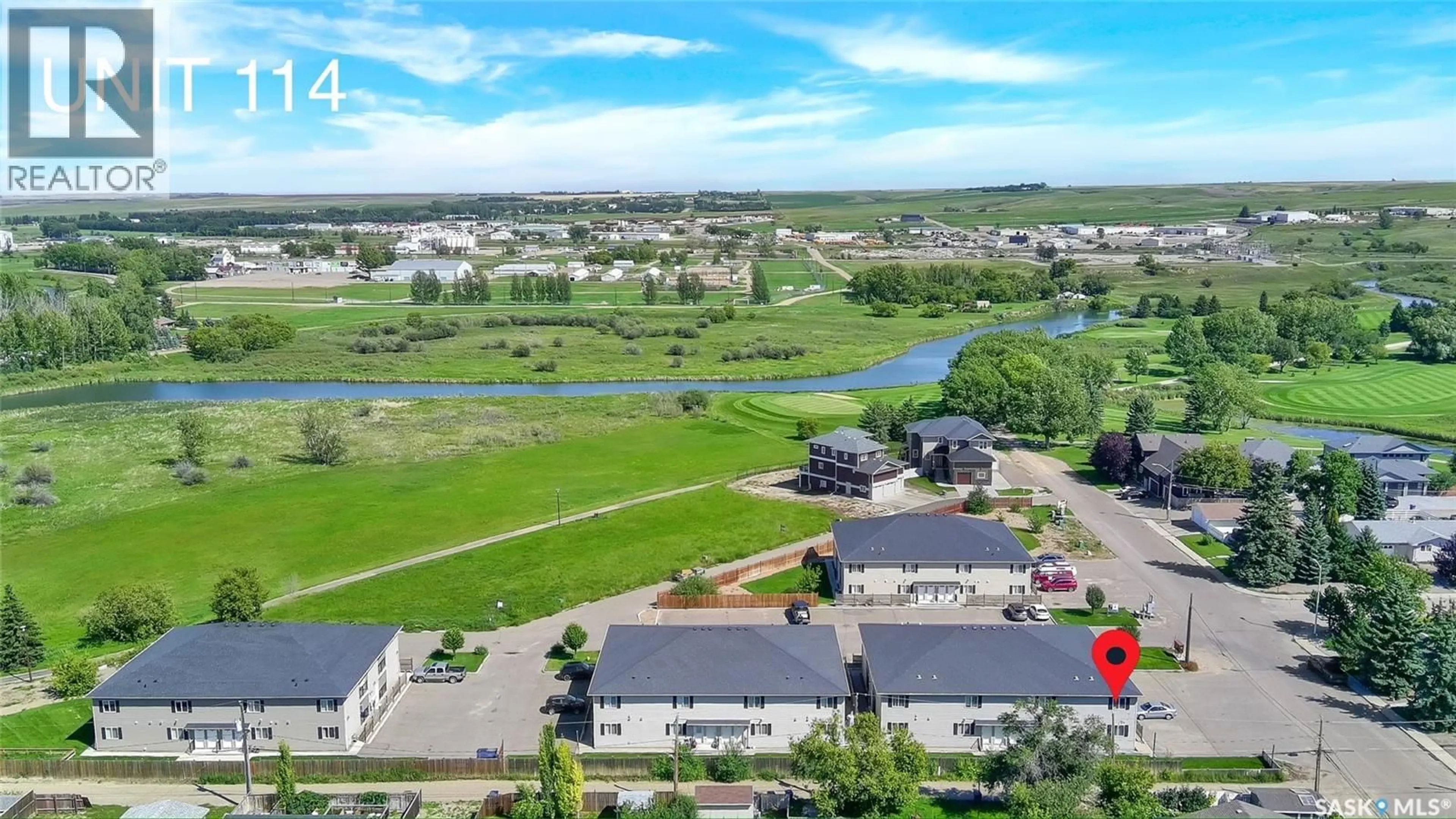 A pic from outside/outdoor area/front of a property/back of a property/a pic from drone, water/lake/river/ocean view for 114 825 GLADSTONE STREET E, Swift Current Saskatchewan S9H5P1