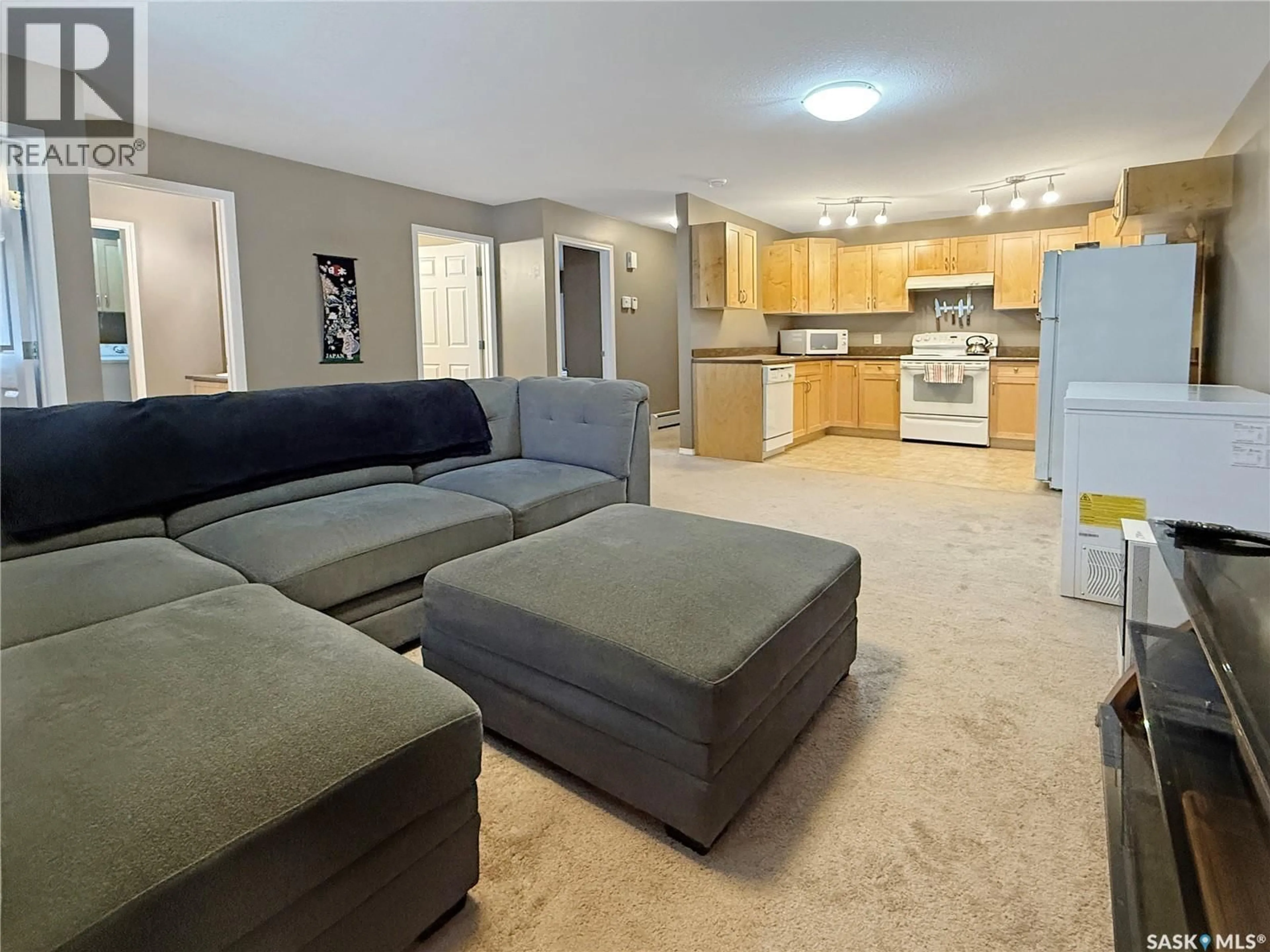 Living room with furniture, unknown for 214 825 GLADSTONE STREET E, Swift Current Saskatchewan S9H5P1