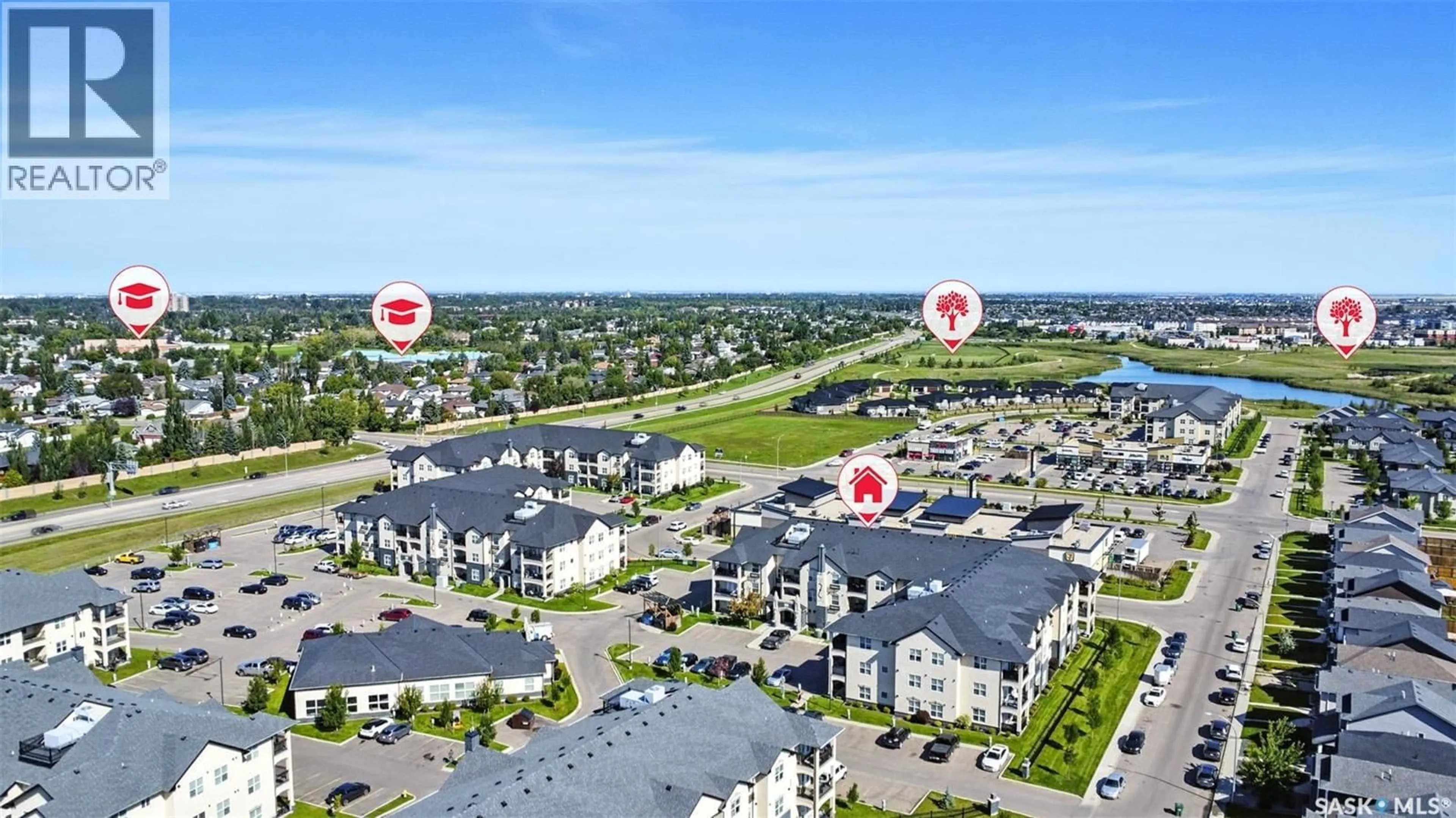 A pic from outside/outdoor area/front of a property/back of a property/a pic from drone, water/lake/river/ocean view for 202 130 PHELPS WAY, Saskatoon Saskatchewan S7V0K5