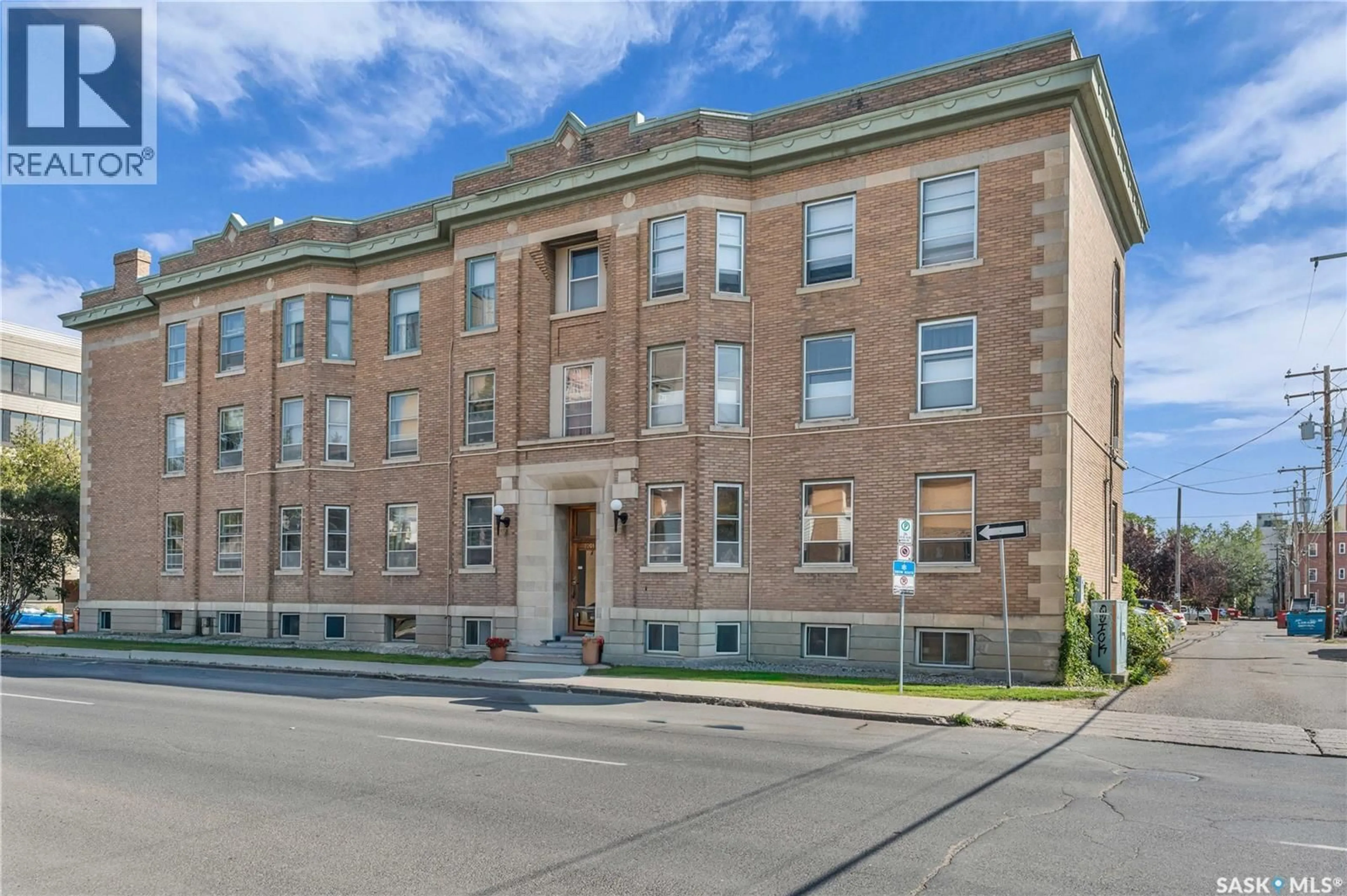 Home with brick exterior material, building for 2201 - 14 14TH AVENUE, Regina Saskatchewan S4P0X9