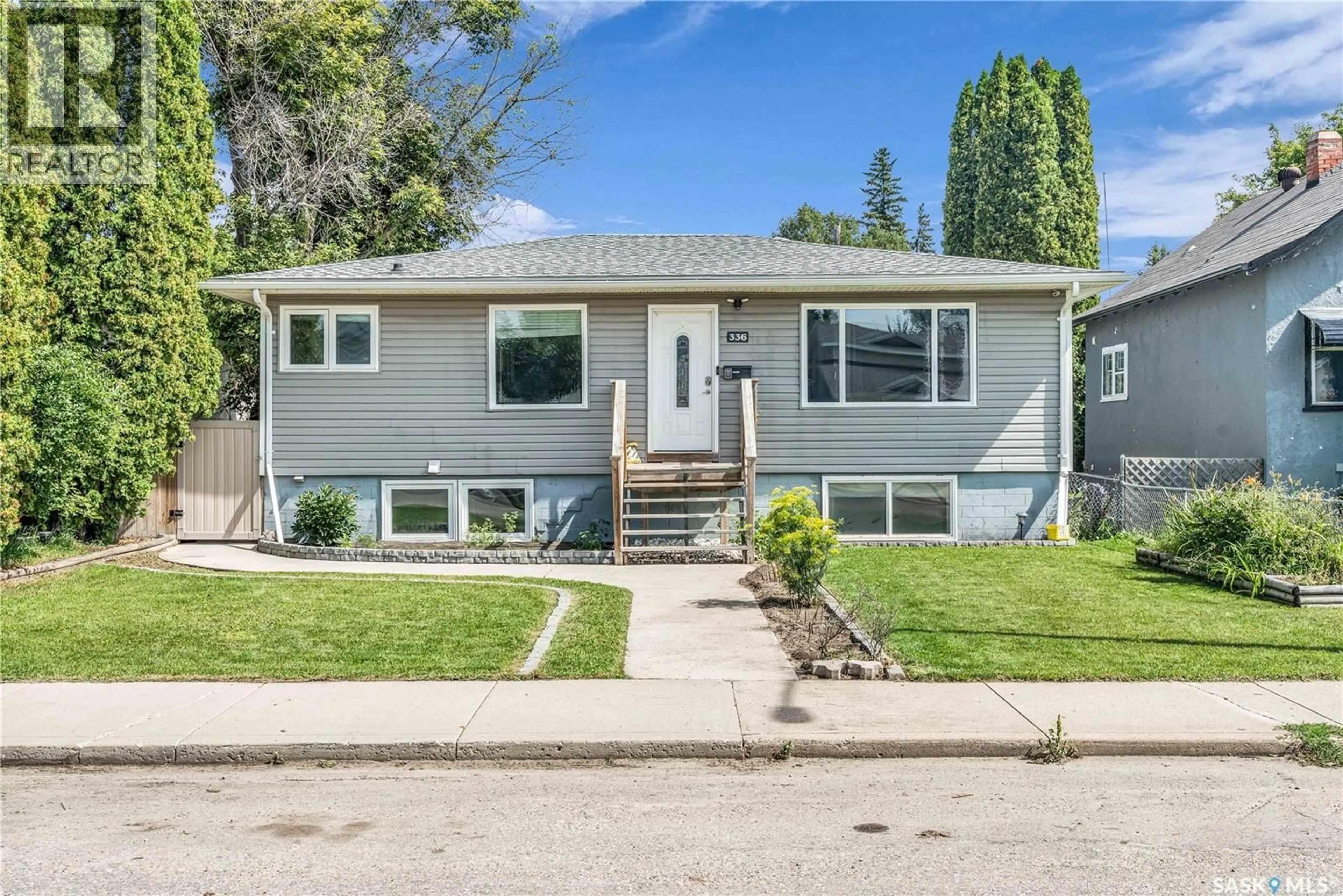 Home with vinyl exterior material, street for 336 X AVENUE, Saskatoon Saskatchewan S7M3H6