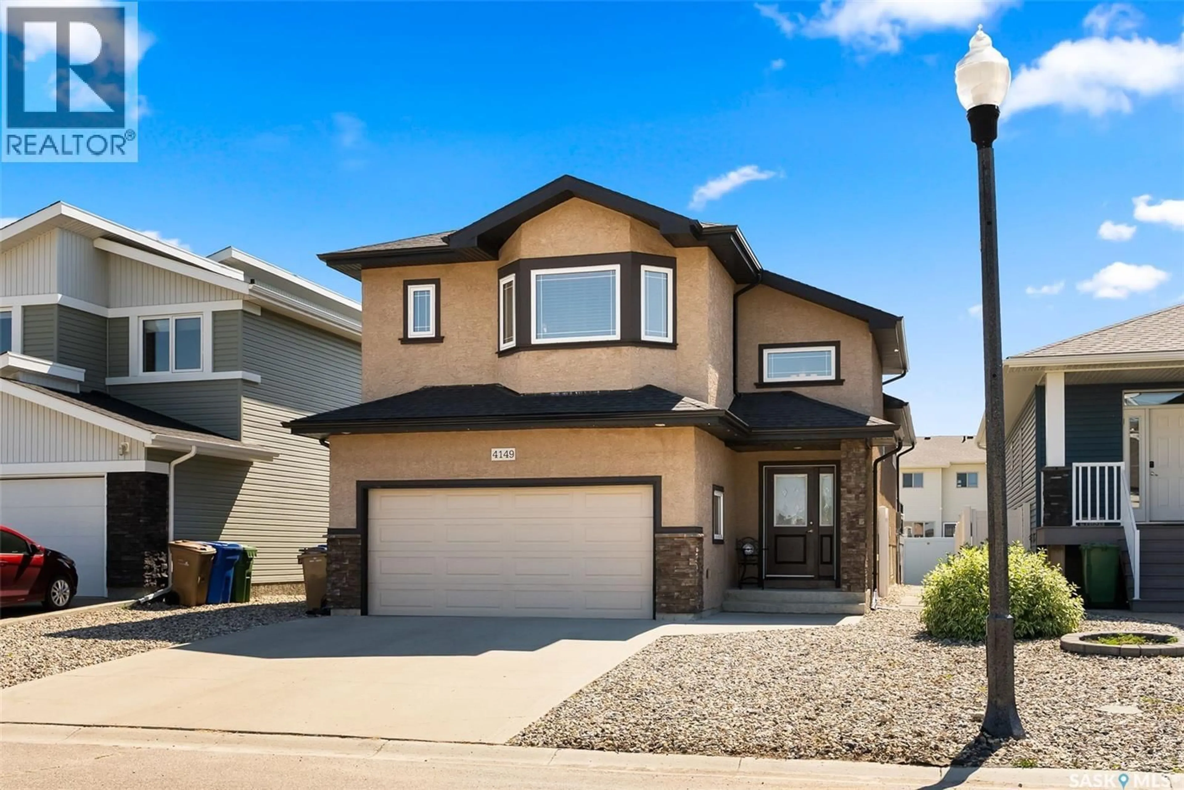 Home with vinyl exterior material, street for 4149 ALTON CRESCENT, Regina Saskatchewan S4W0G7