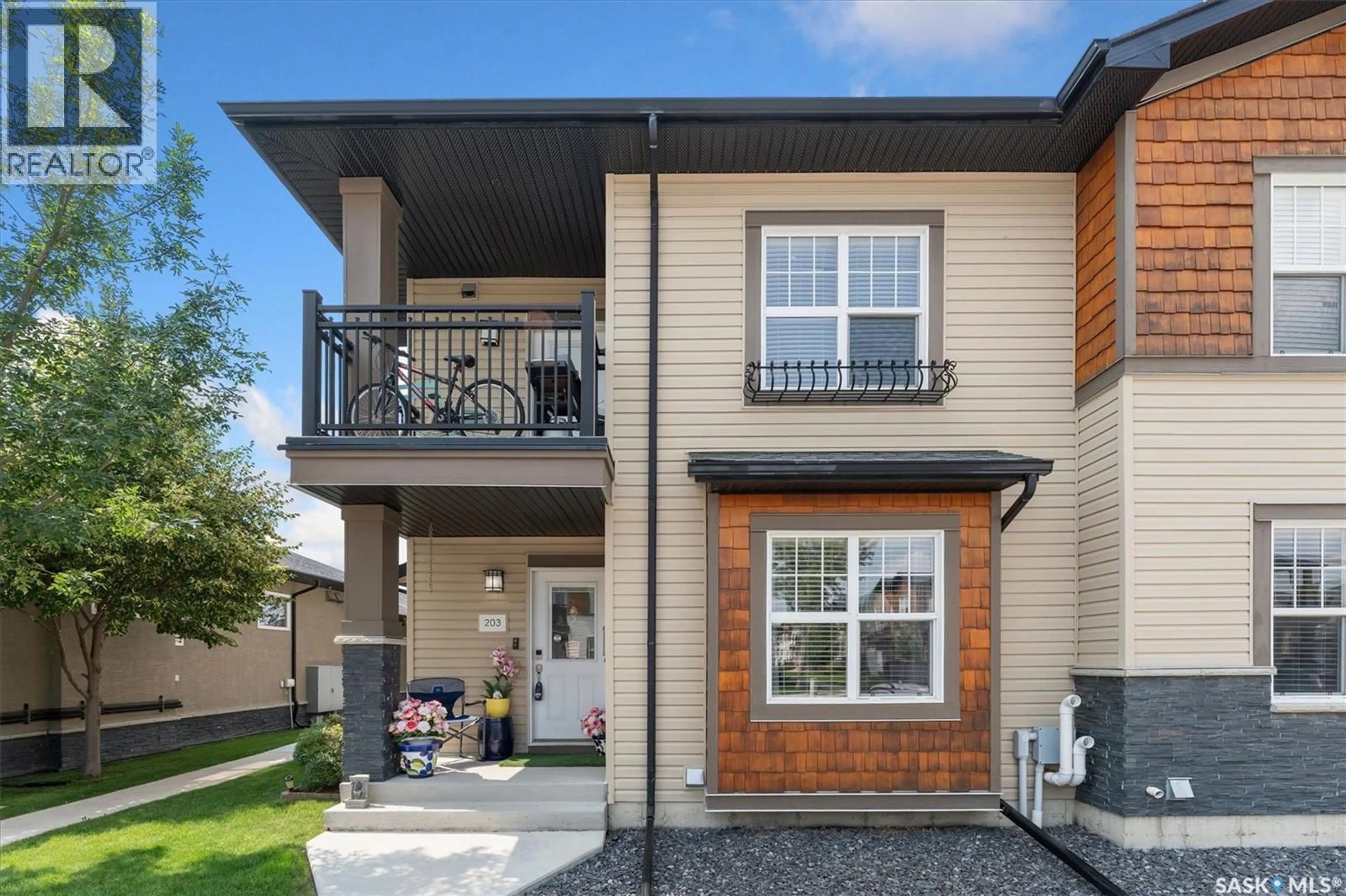 Home with brick exterior material, street for 203 - 1015 PATRICK CRESCENT, Saskatoon Saskatchewan S7W0M1