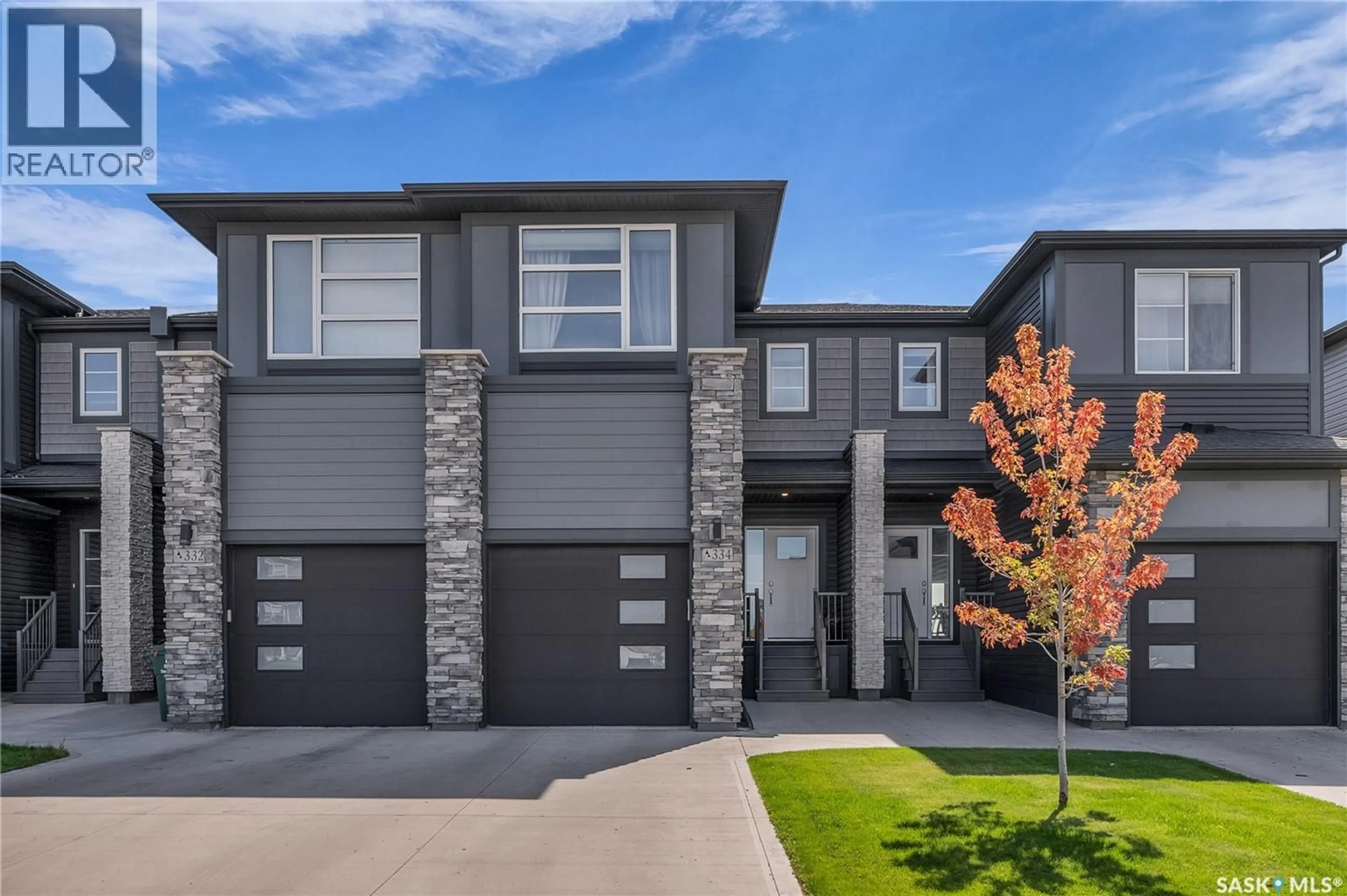 Home with brick exterior material, street for 334 BRIGHTON GATE, Saskatoon Saskatchewan S7V0R1