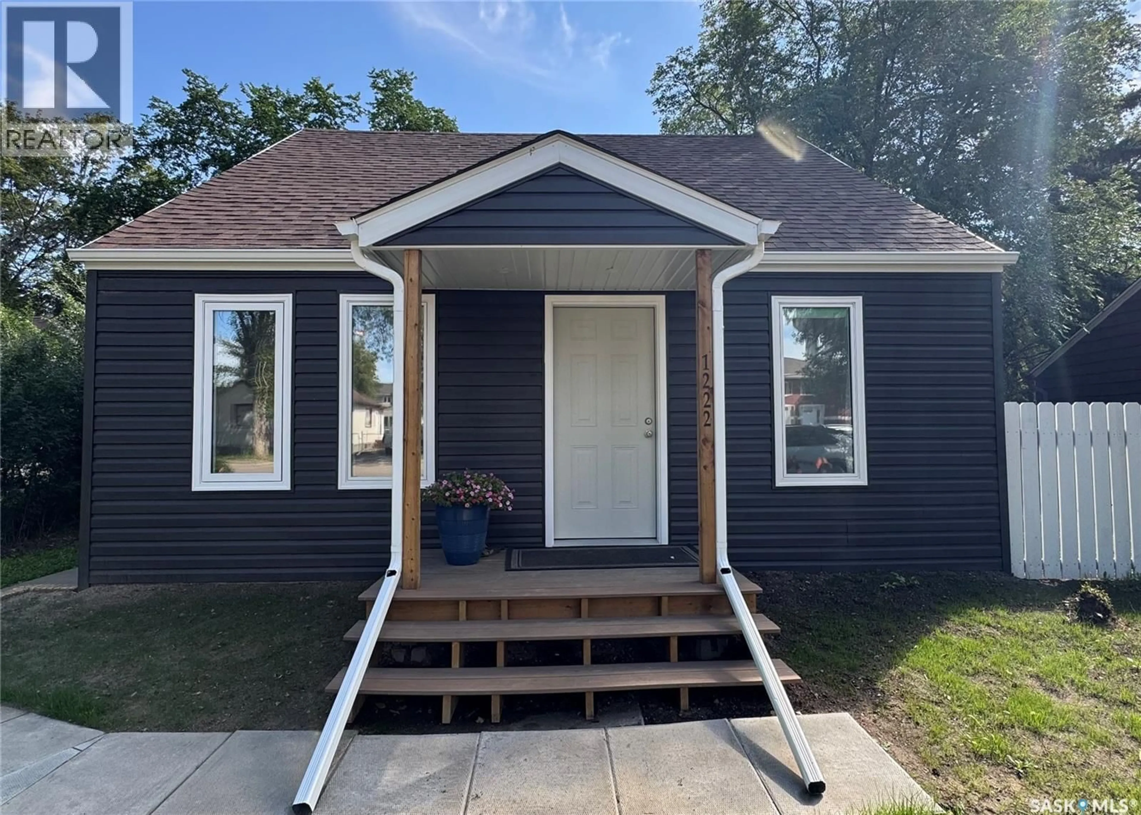Home with vinyl exterior material, street for 1222 106TH STREET, North Battleford Saskatchewan S9A1X2