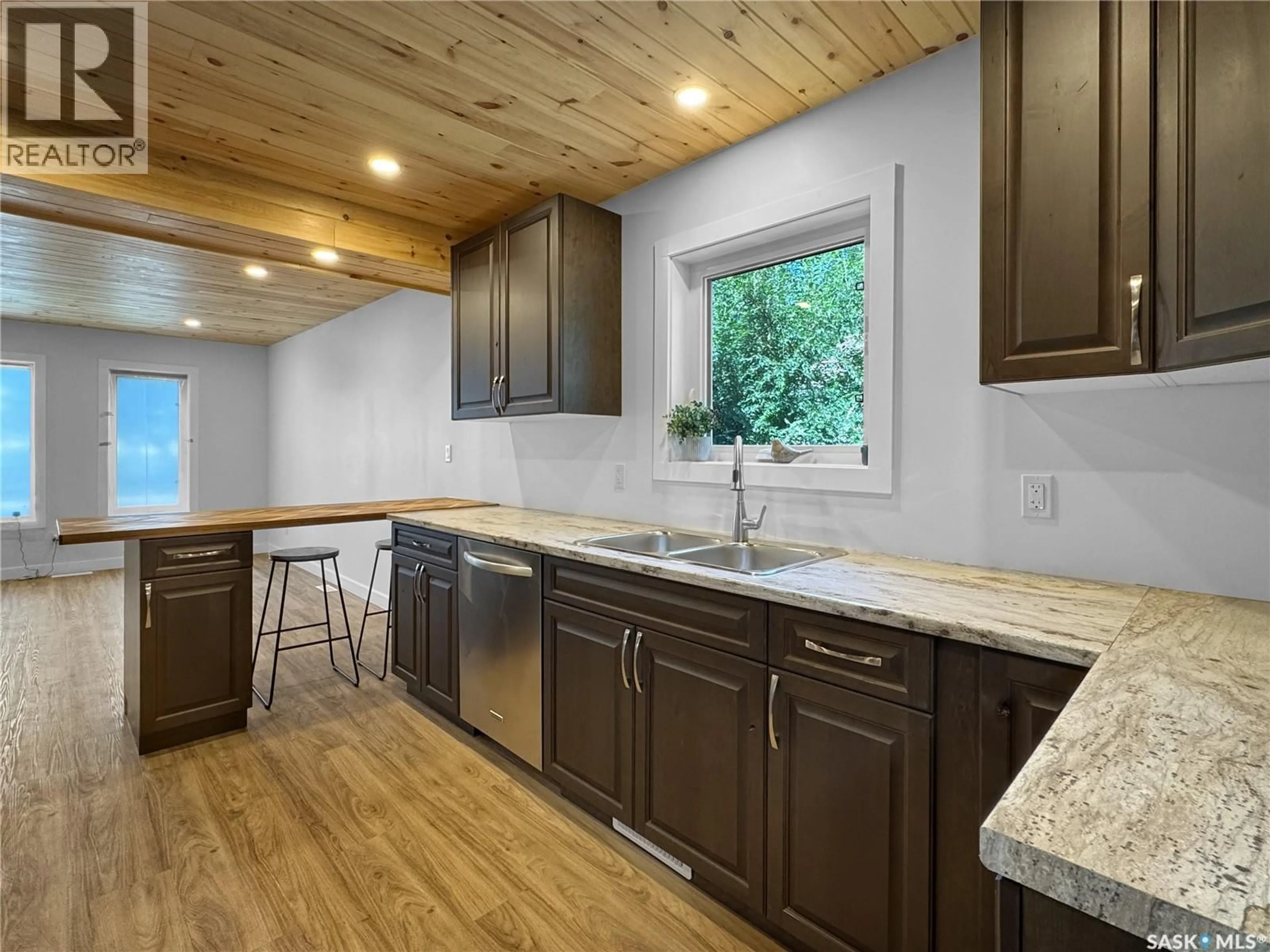 Open concept kitchen, unknown for 1222 106TH STREET, North Battleford Saskatchewan S9A1X2