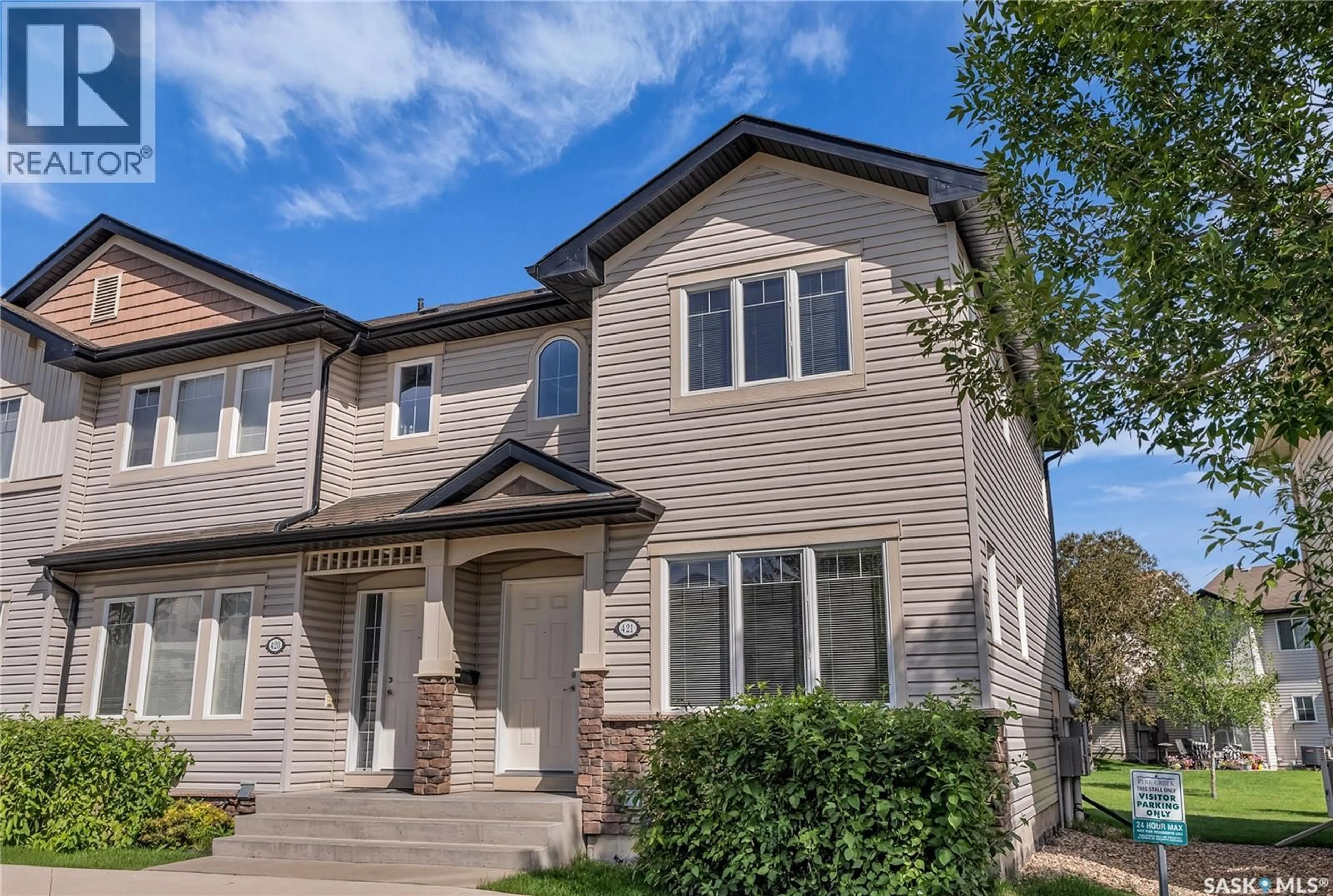 Home with vinyl exterior material, street for 303 - 421 SLIMMON PLACE, Saskatoon Saskatchewan S7V0A8