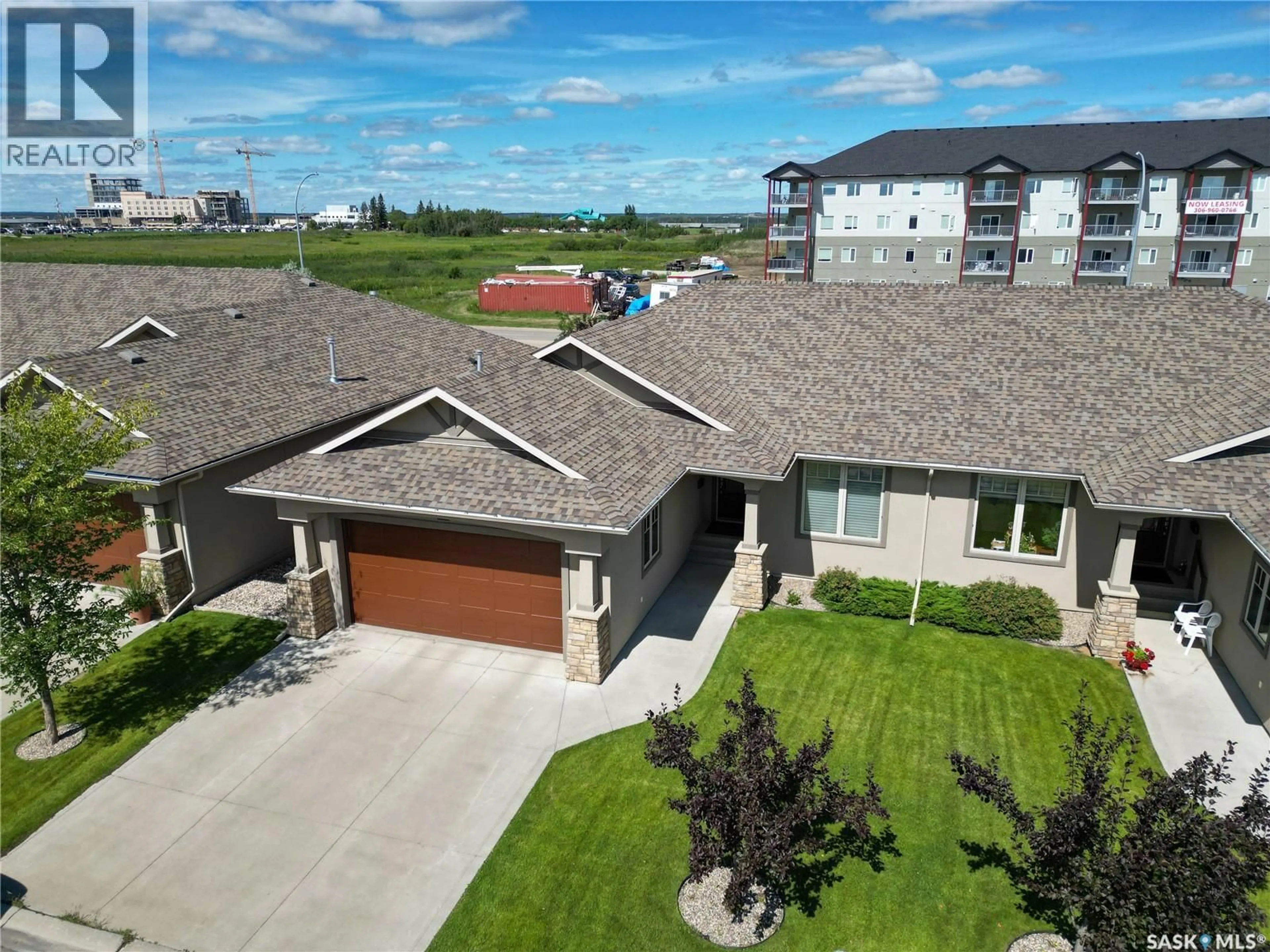 A pic from outside/outdoor area/front of a property/back of a property/a pic from drone, street for 20 - 2805 LAKEVIEW DRIVE, Prince Albert Saskatchewan S6W0A4