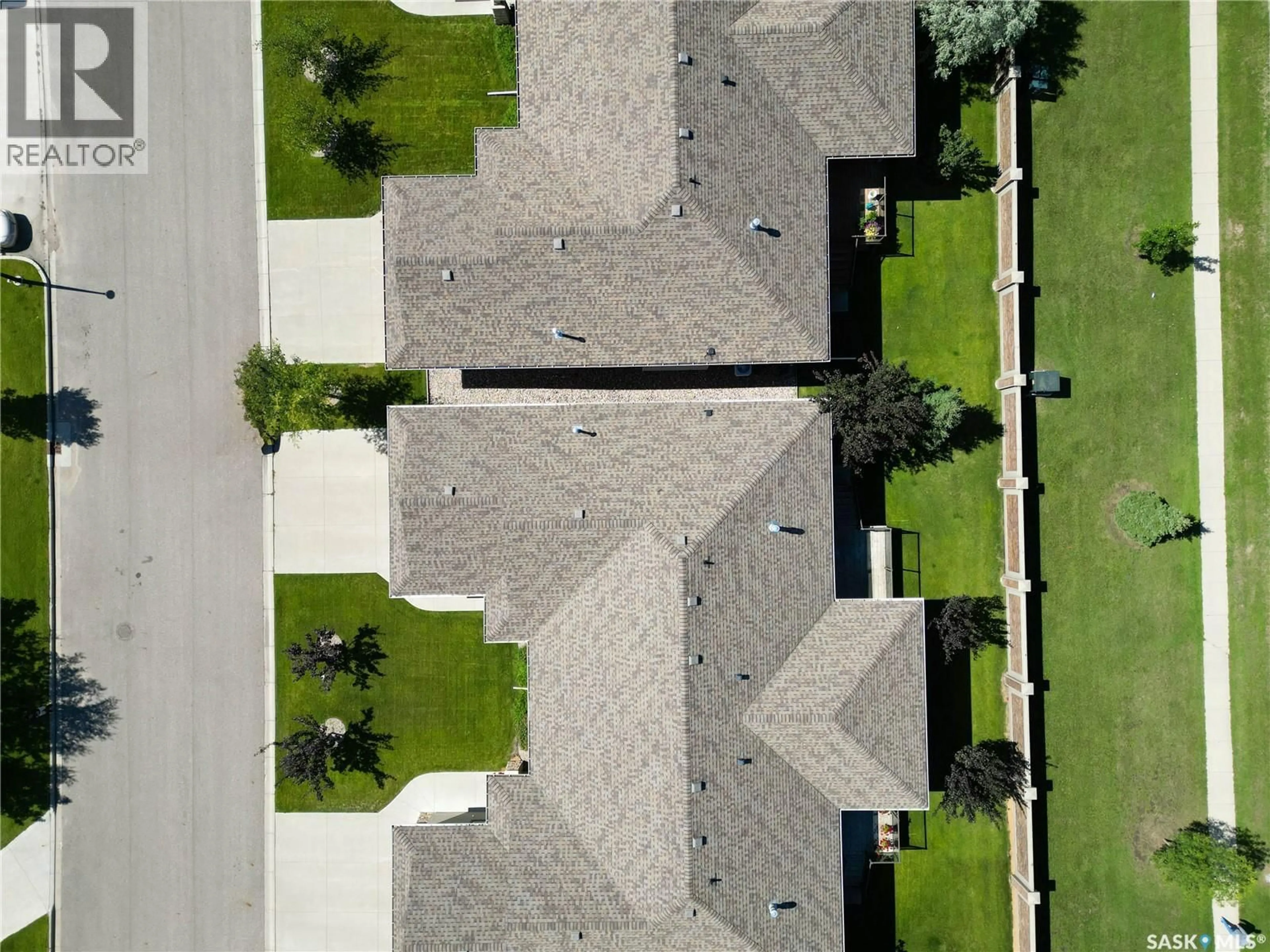 A pic from outside/outdoor area/front of a property/back of a property/a pic from drone, street for 20 - 2805 LAKEVIEW DRIVE, Prince Albert Saskatchewan S6W0A4