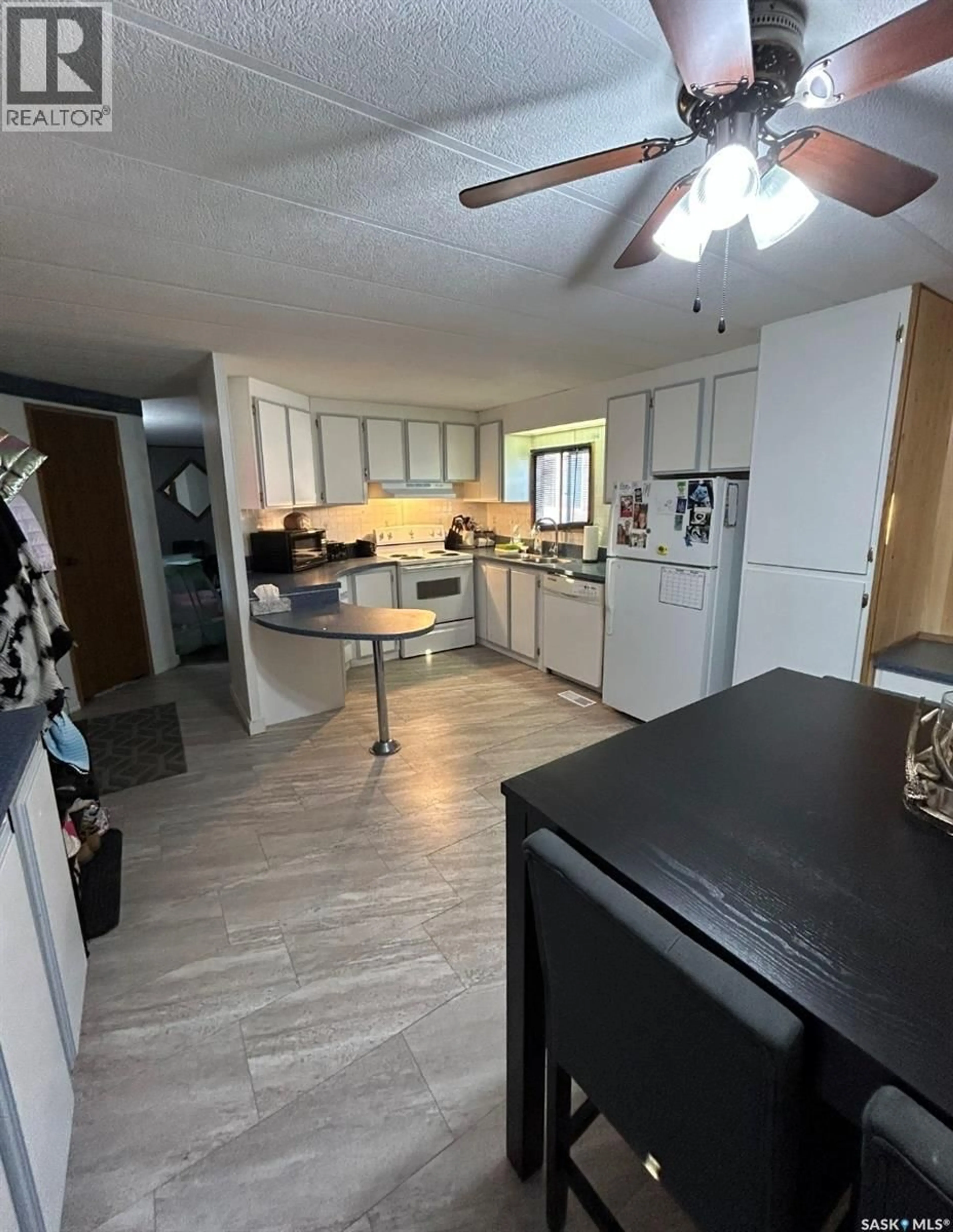 Open concept kitchen, unknown for SW - 68 106 1ST AVENUE, Weyburn Saskatchewan S4H2J1