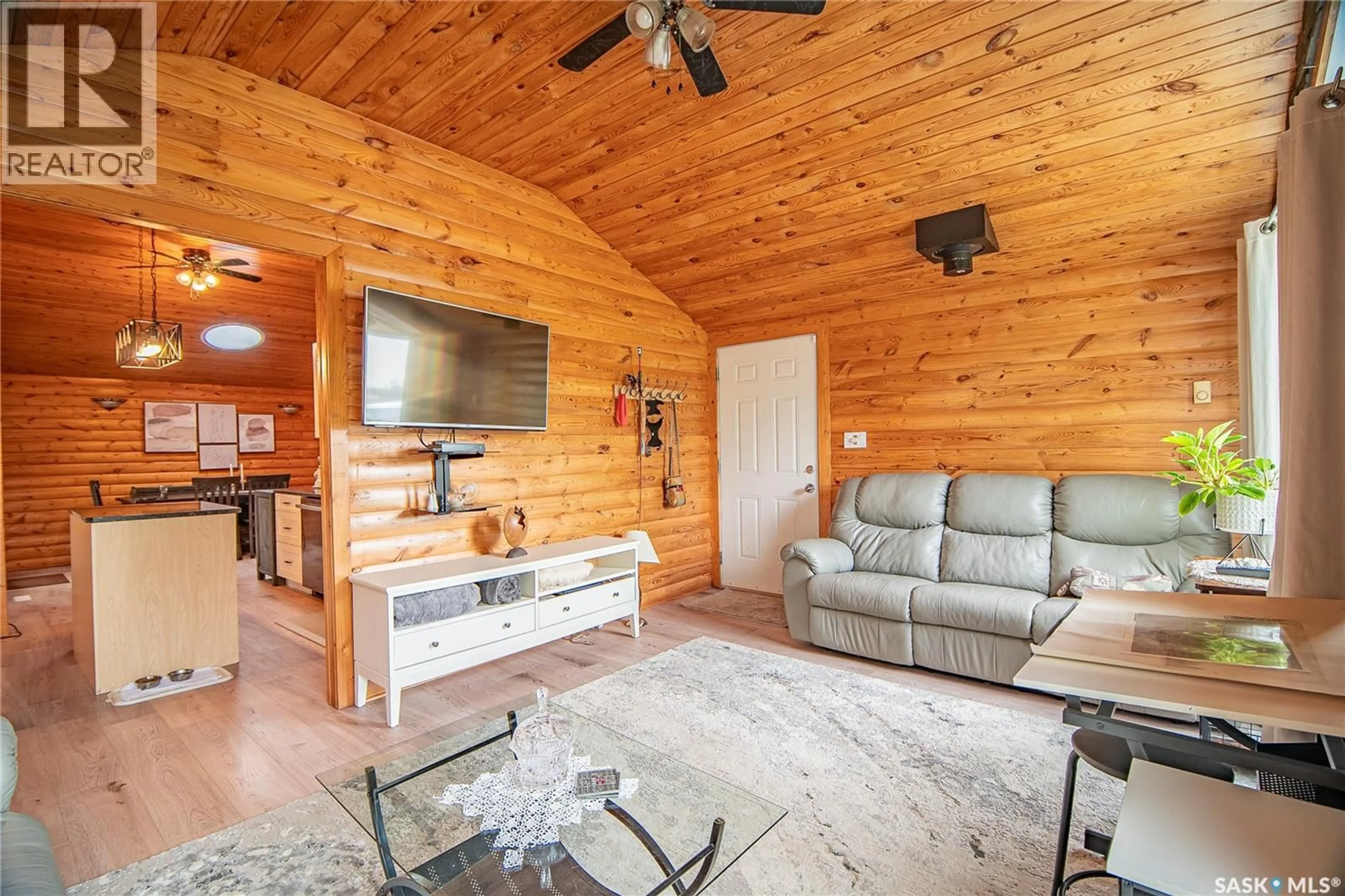 Living room with furniture, wood/laminate floor for 2 MARTIN DRIVE, Candle Lake Saskatchewan S0J3E0