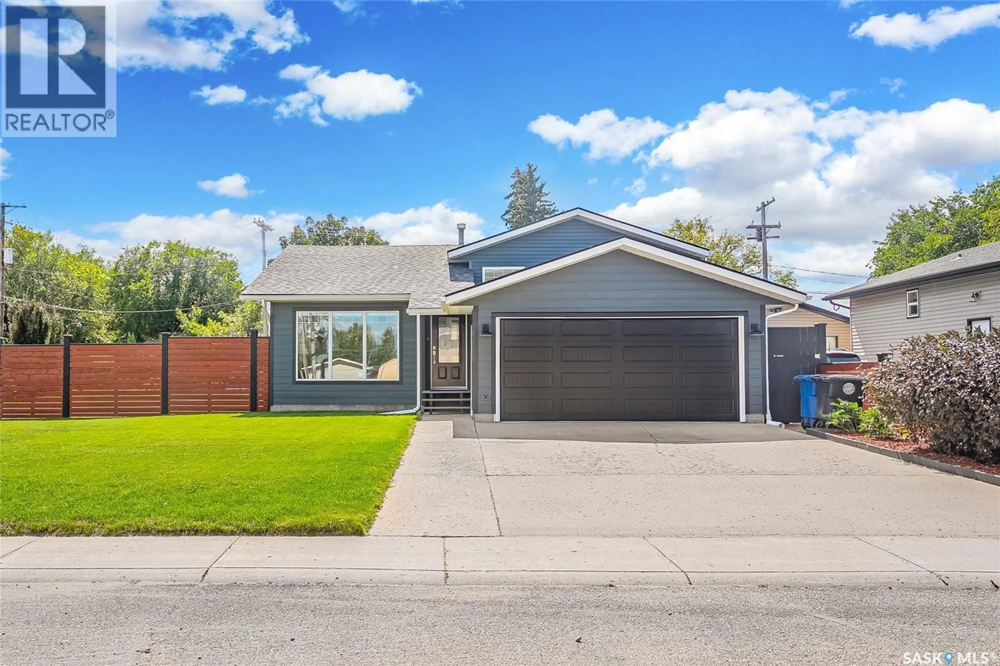 Home with vinyl exterior material, street for 104 8TH AVENUE, Biggar Saskatchewan S0K0M0