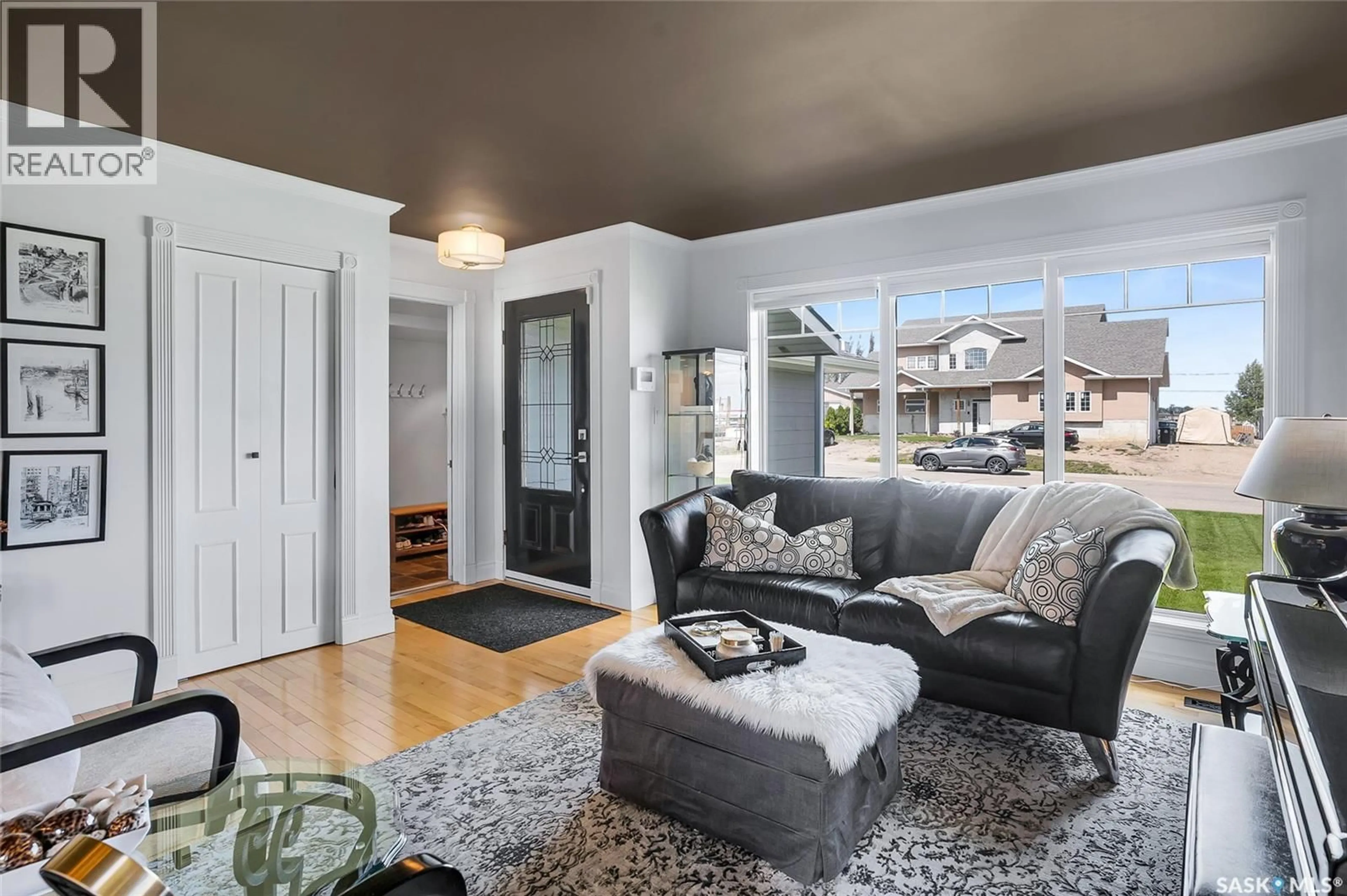 Living room with furniture, unknown for 104 8TH AVENUE, Biggar Saskatchewan S0K0M0
