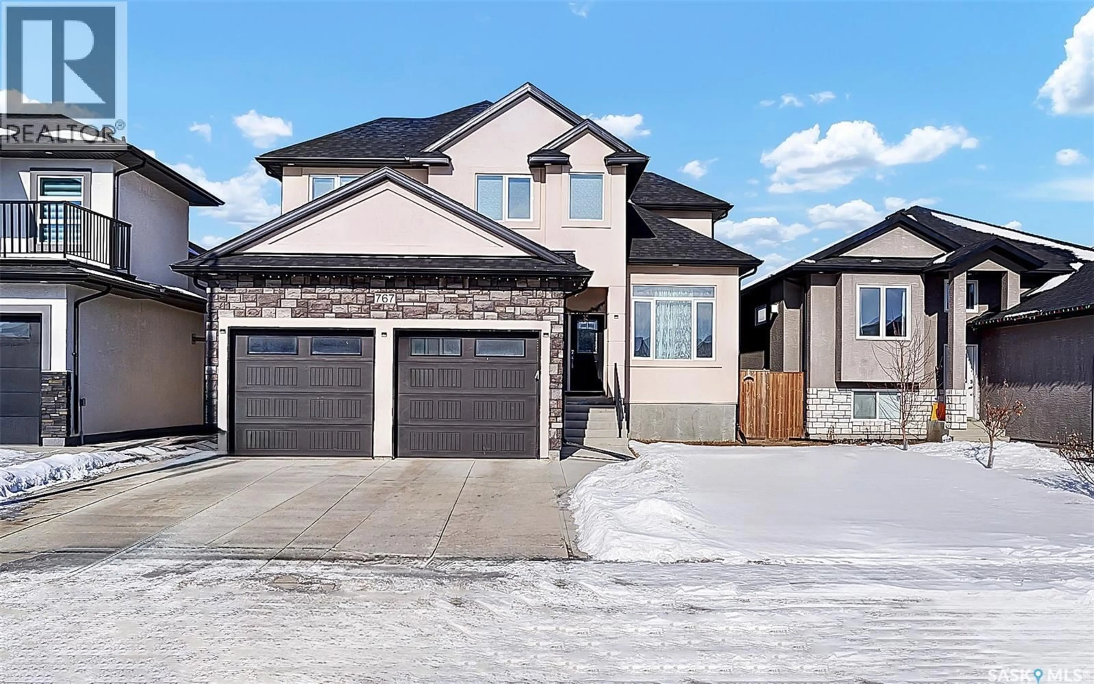 Home with vinyl exterior material, street for 767 LABINE COURT, Saskatoon Saskatchewan S7L6G7