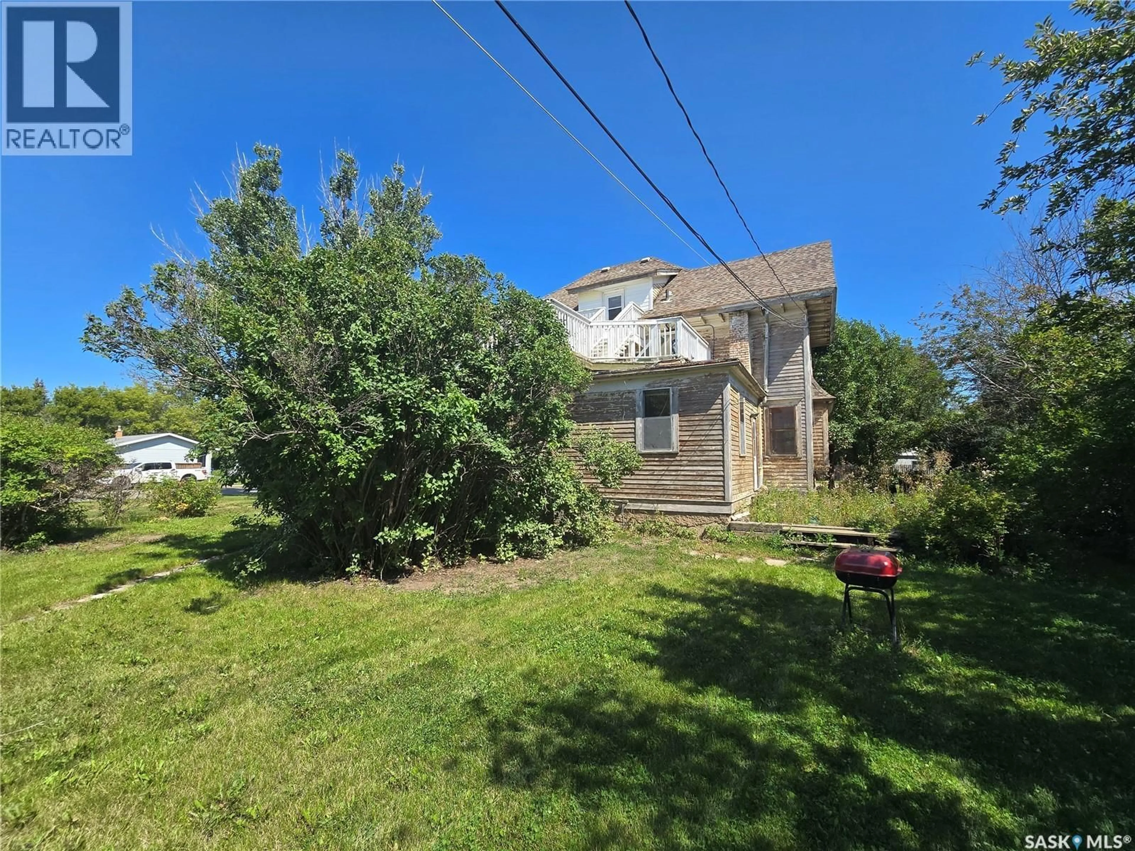 A pic from outside/outdoor area/front of a property/back of a property/a pic from drone, street for 347 GOVERNMENT ROAD, Weyburn Saskatchewan S4H0P5