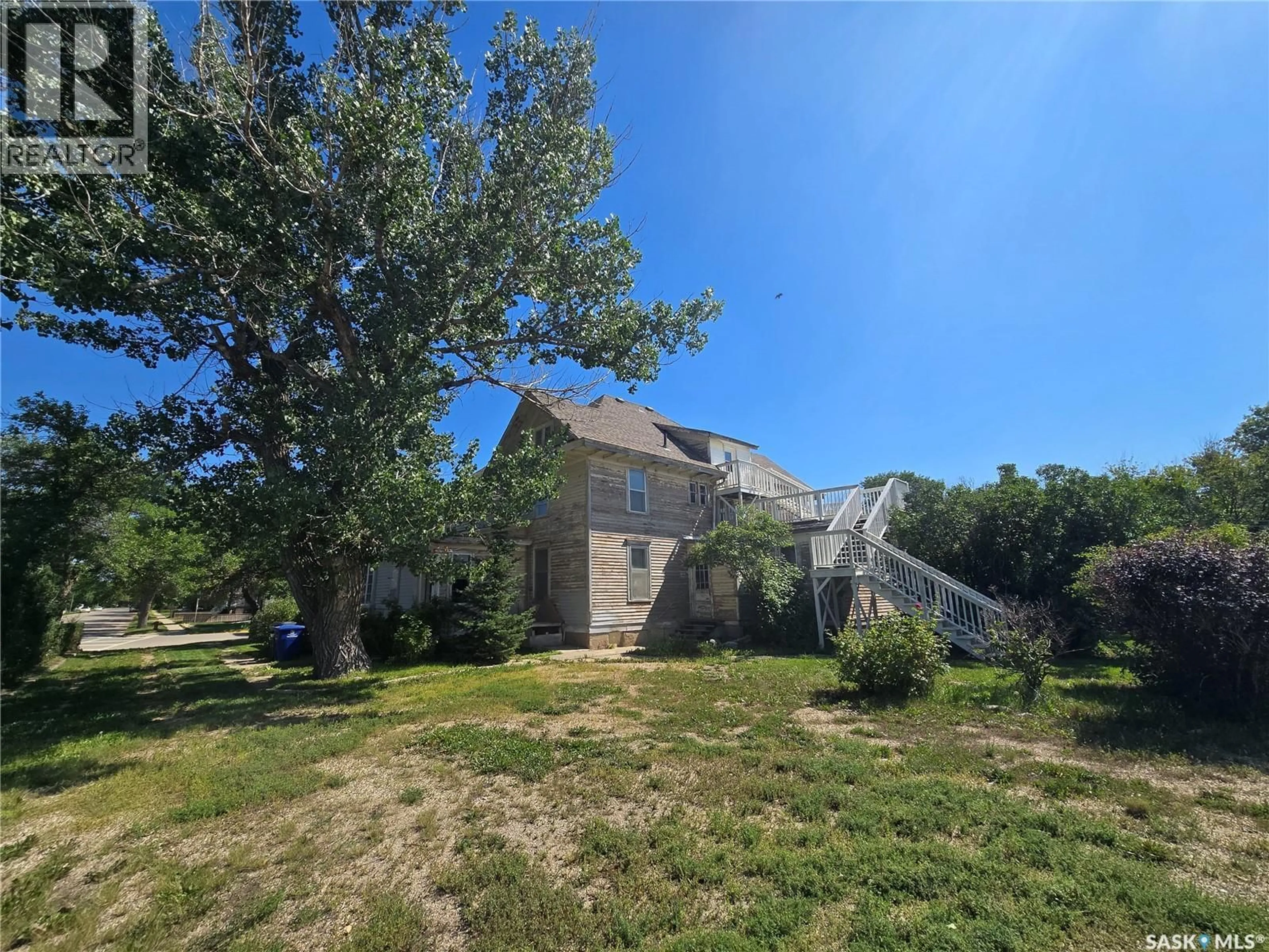 A pic from outside/outdoor area/front of a property/back of a property/a pic from drone, unknown for 347 GOVERNMENT ROAD, Weyburn Saskatchewan S4H0P5