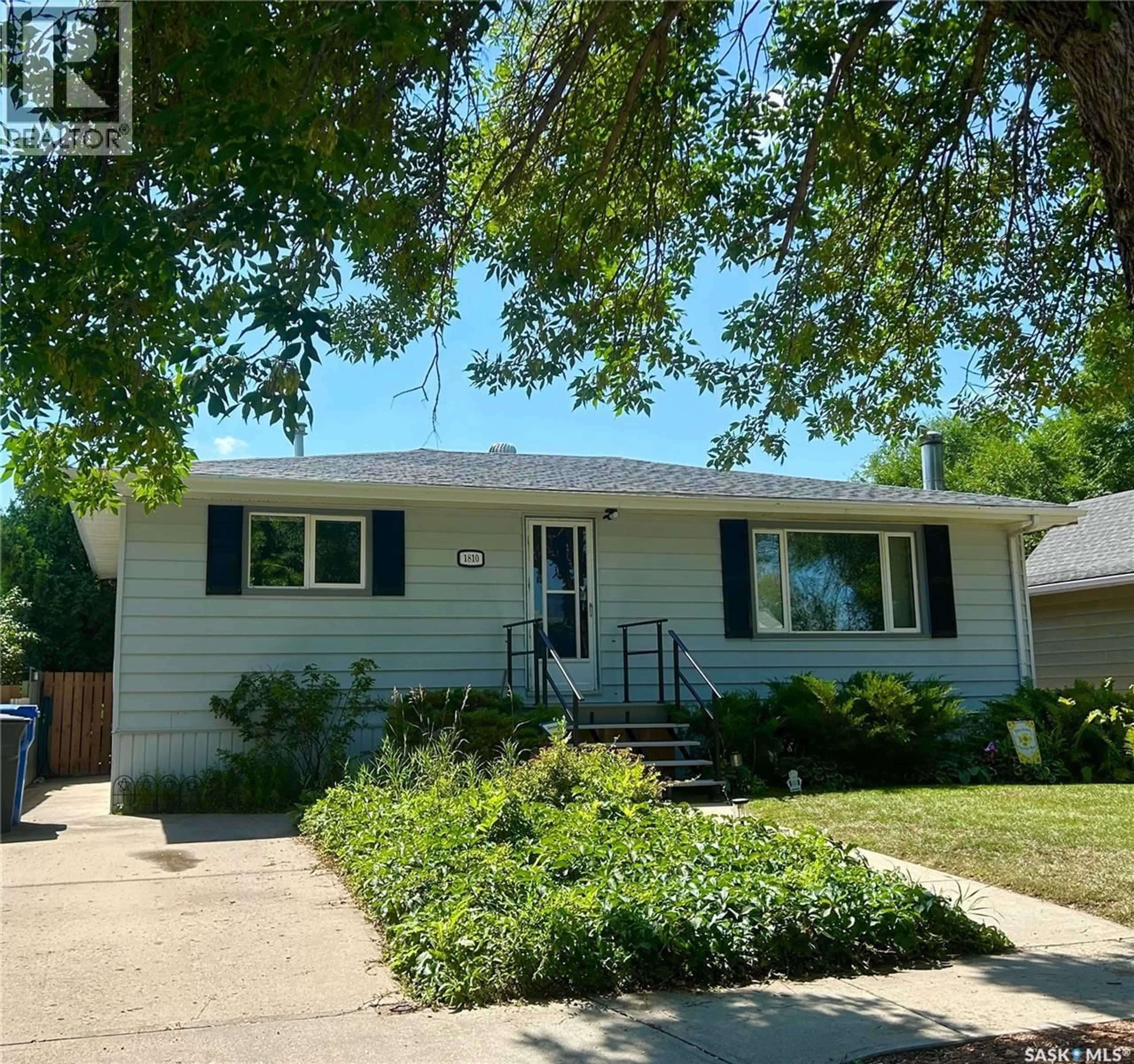 Home with vinyl exterior material, street for 1810 3RD STREET, Estevan Saskatchewan S4A0T2
