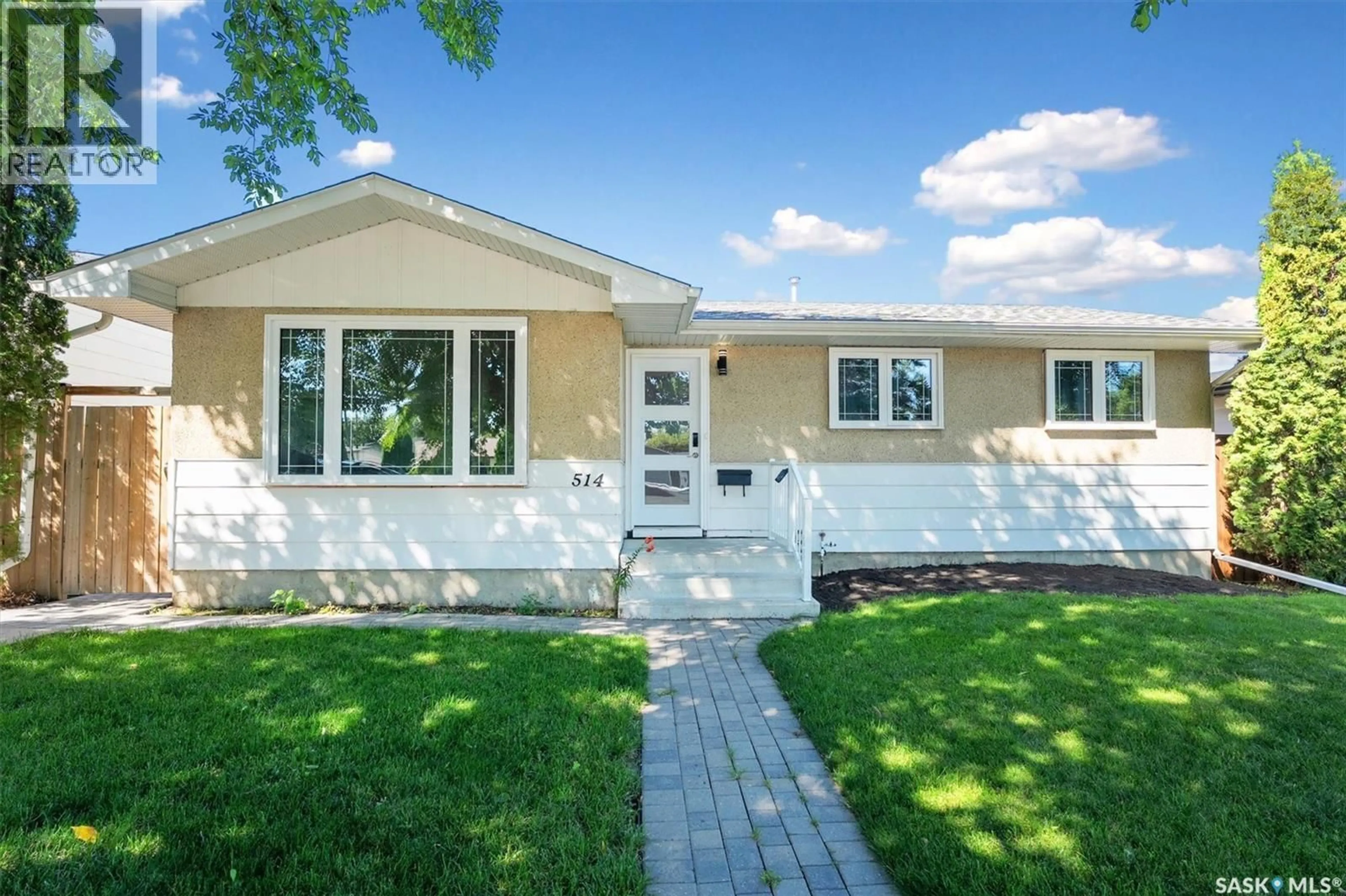 Home with vinyl exterior material, street for 514 MCKERCHER DRIVE, Saskatoon Saskatchewan S7H3W6