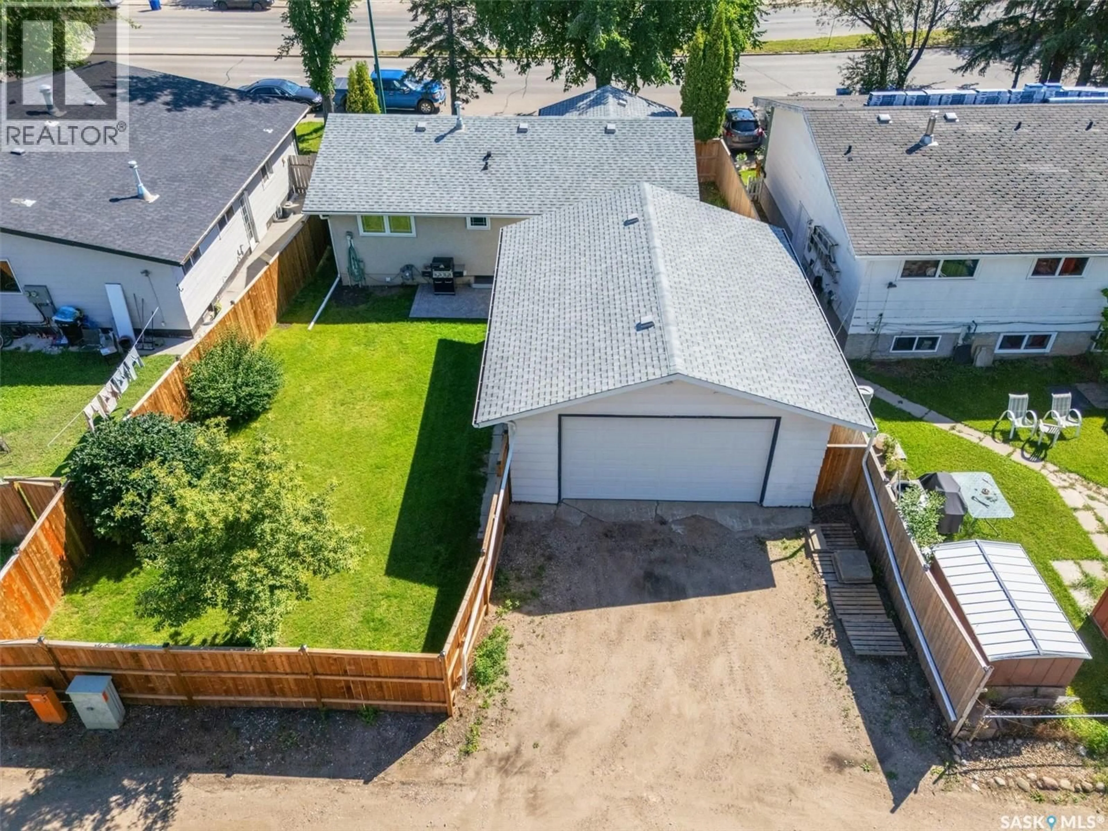 A pic from outside/outdoor area/front of a property/back of a property/a pic from drone, street for 514 MCKERCHER DRIVE, Saskatoon Saskatchewan S7H3W6