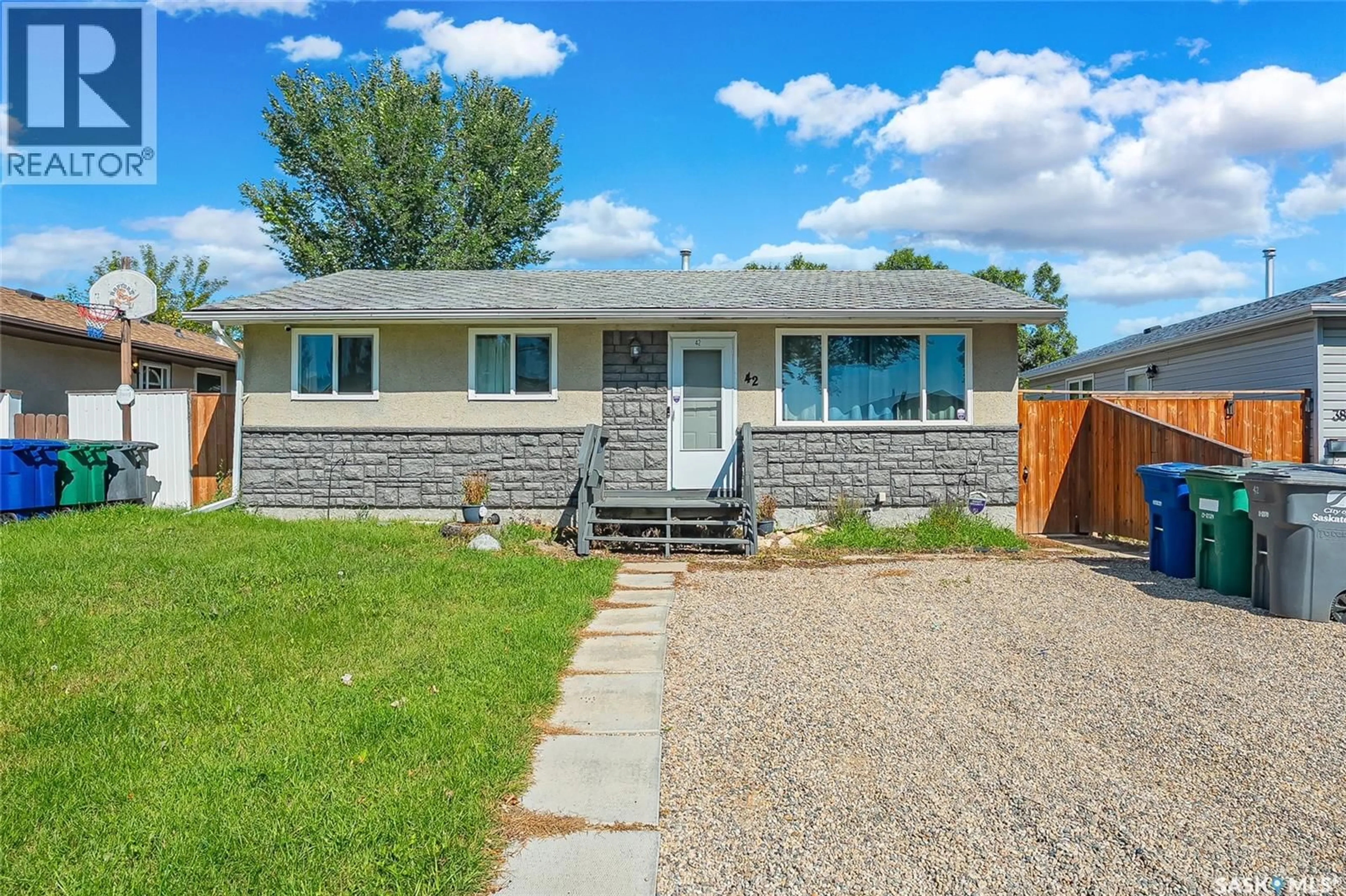 Home with vinyl exterior material, street for 42 DOMINION CRESCENT, Saskatoon Saskatchewan S7L4N7