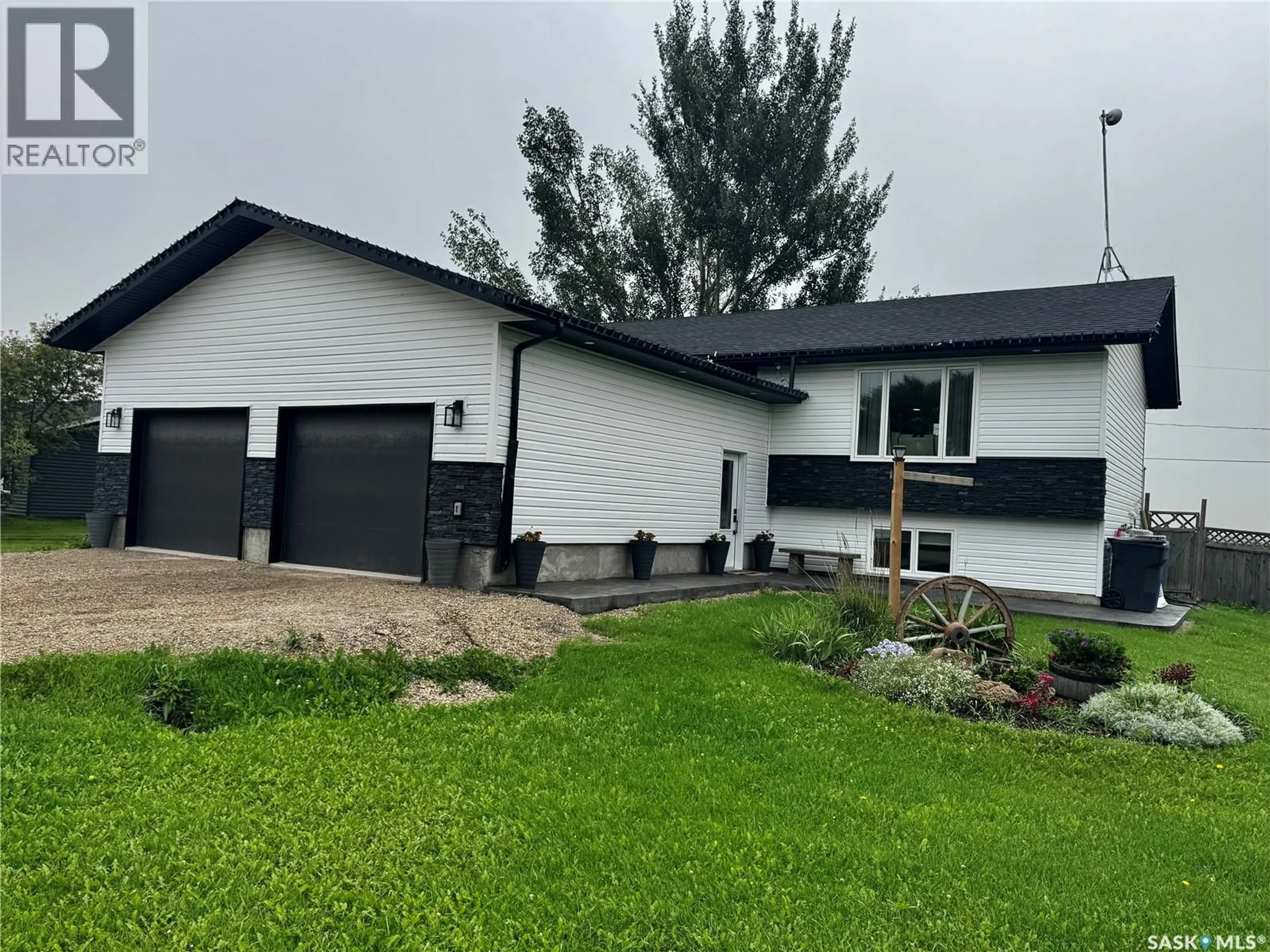Home with vinyl exterior material, street for 312 MAIN STREET, Ebenezer Saskatchewan S0A0T0