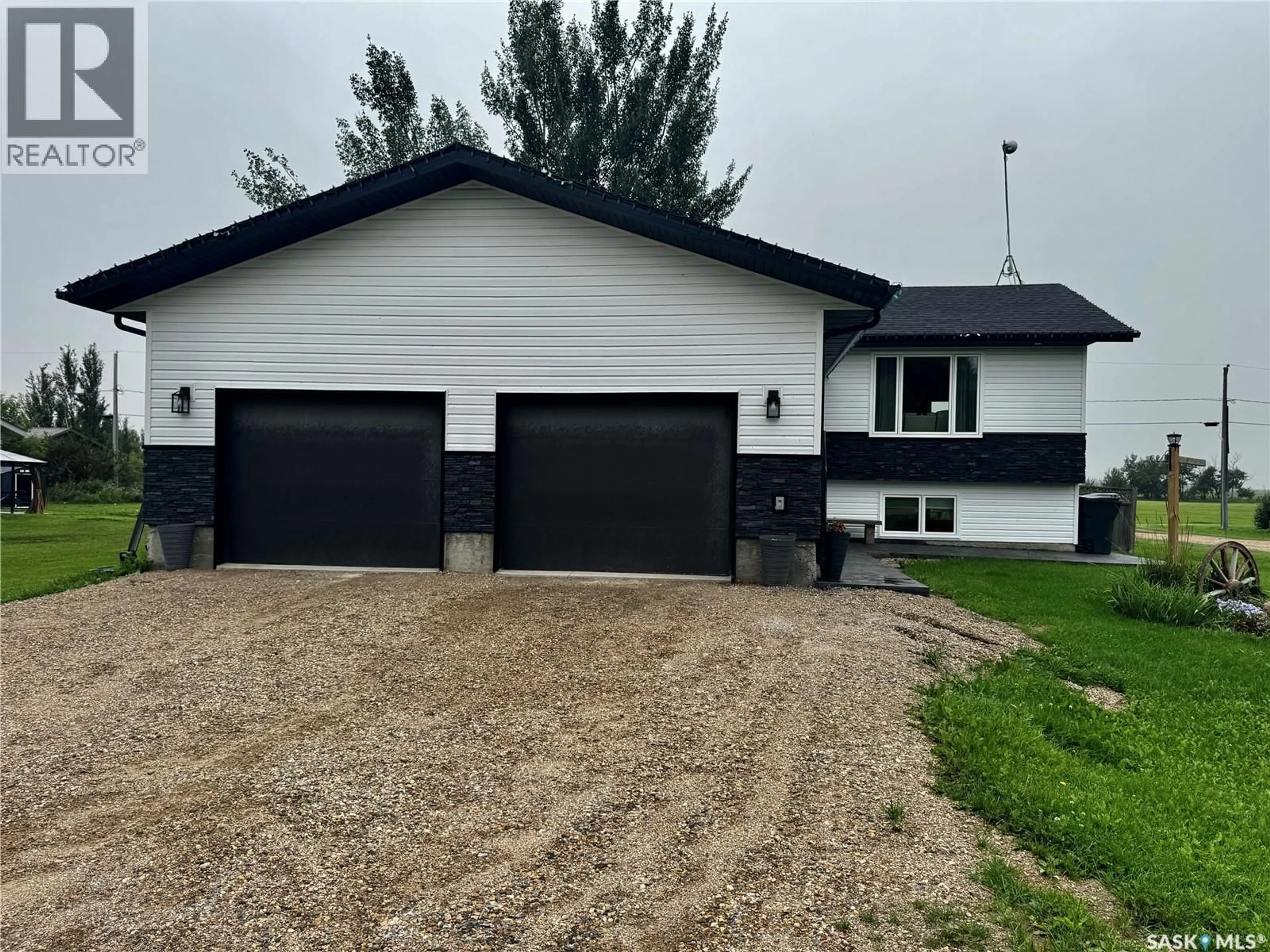 Home with vinyl exterior material, street for 312 MAIN STREET, Ebenezer Saskatchewan S0A0T0