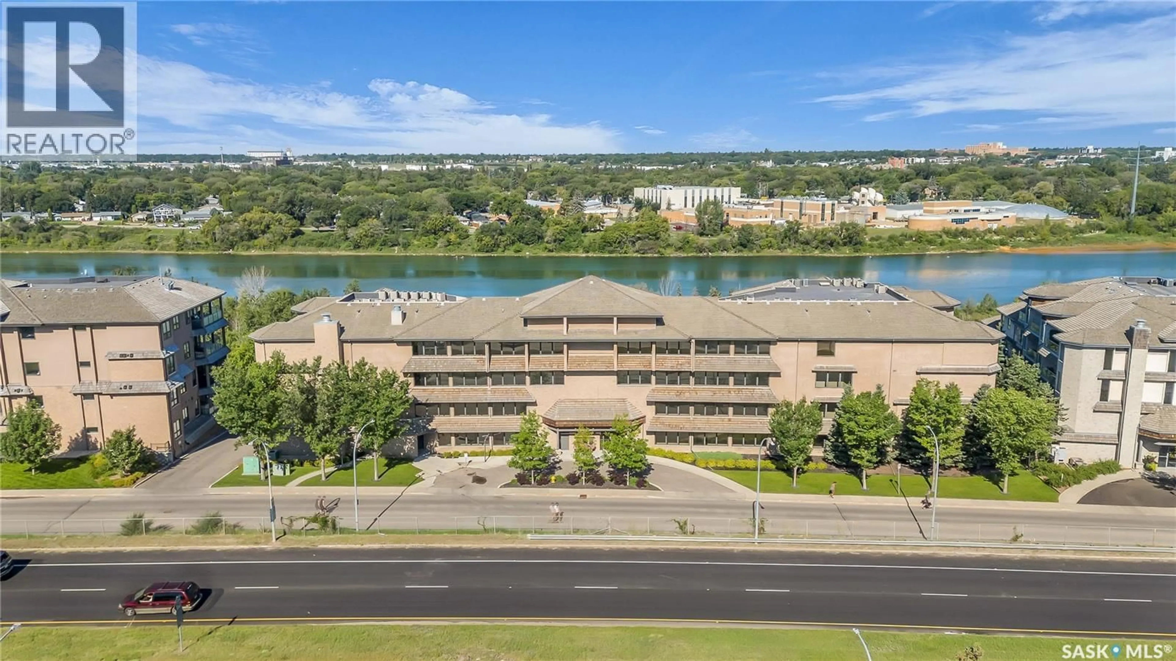 A pic from outside/outdoor area/front of a property/back of a property/a pic from drone, water/lake/river/ocean view for 135 623 SASKATCHEWAN CRESCENT, Saskatoon Saskatchewan S7M0A5