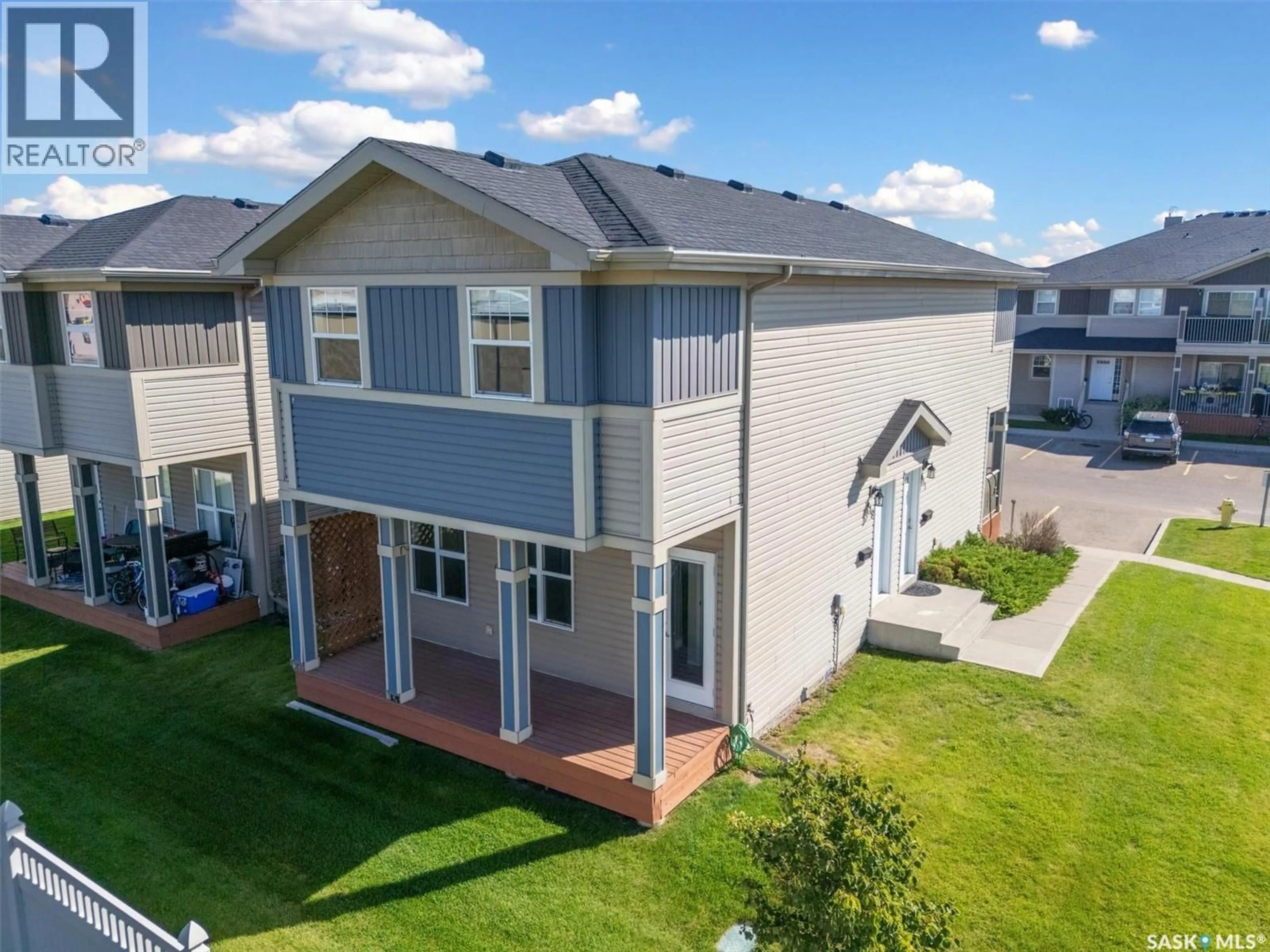 A pic from outside/outdoor area/front of a property/back of a property/a pic from drone, unknown for 418 100 CHAPARRAL BOULEVARD, Martensville Saskatchewan S0K0A2