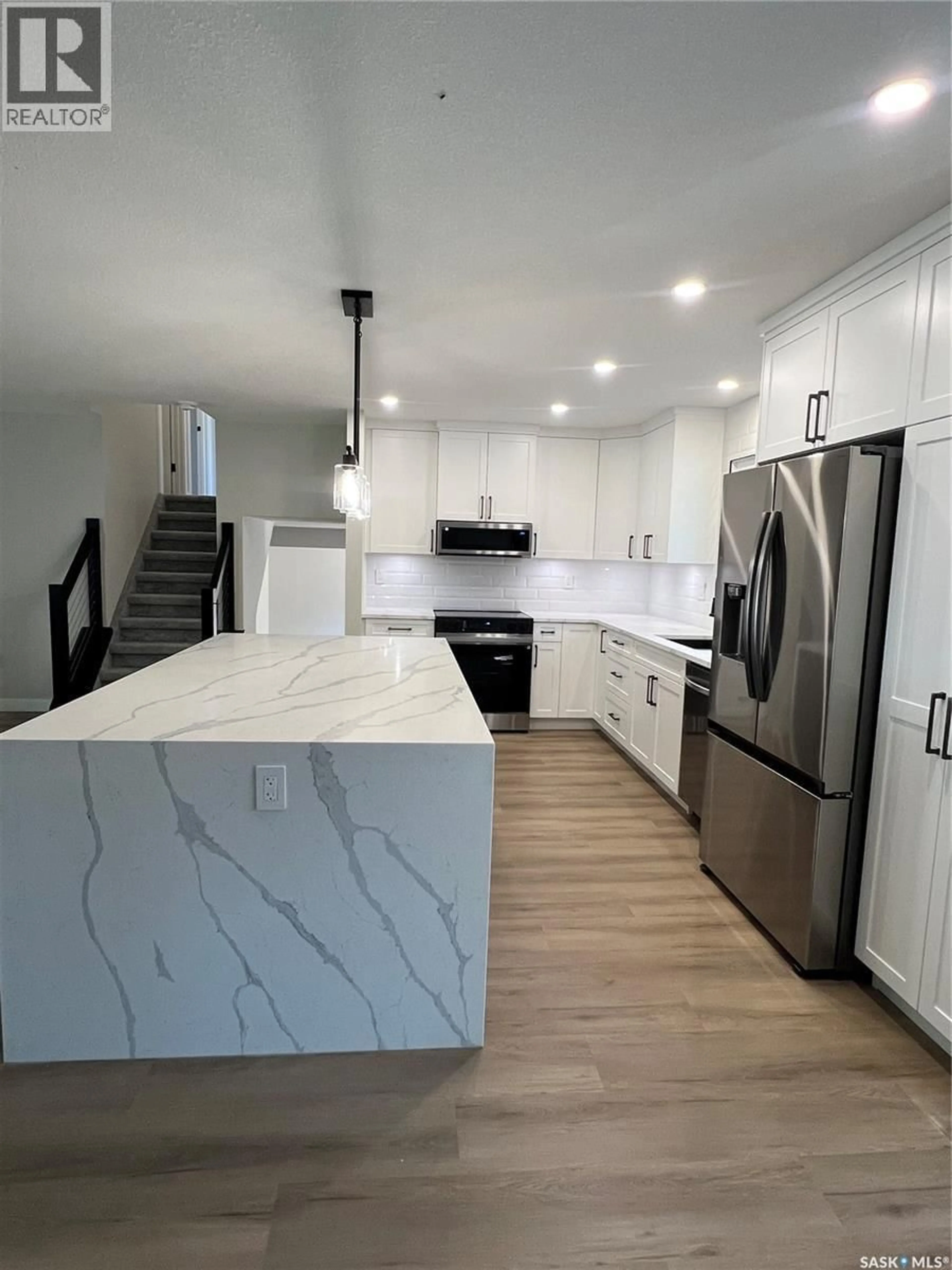 Open concept kitchen, unknown for 27 LAUBACH AVENUE, Regina Saskatchewan S4S6C3