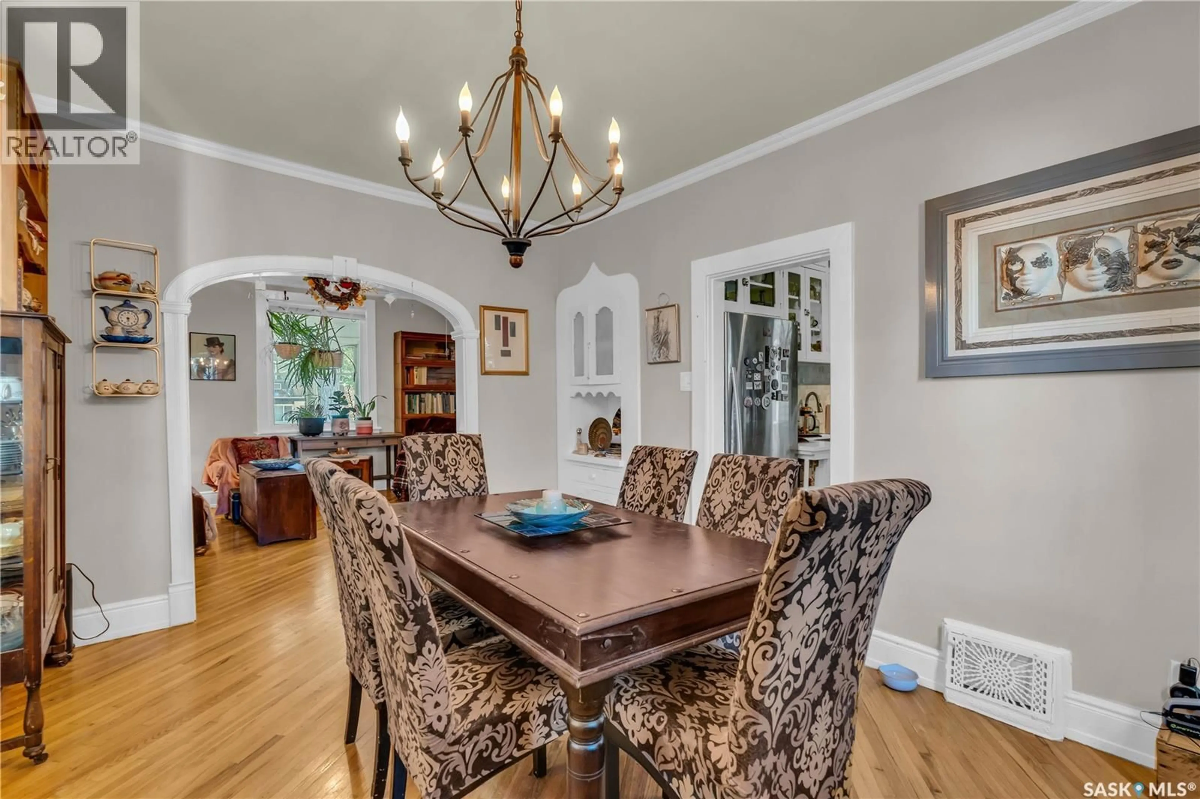 Dining room, wood/laminate floor for 2152 RAE STREET, Regina Saskatchewan S4T2E7