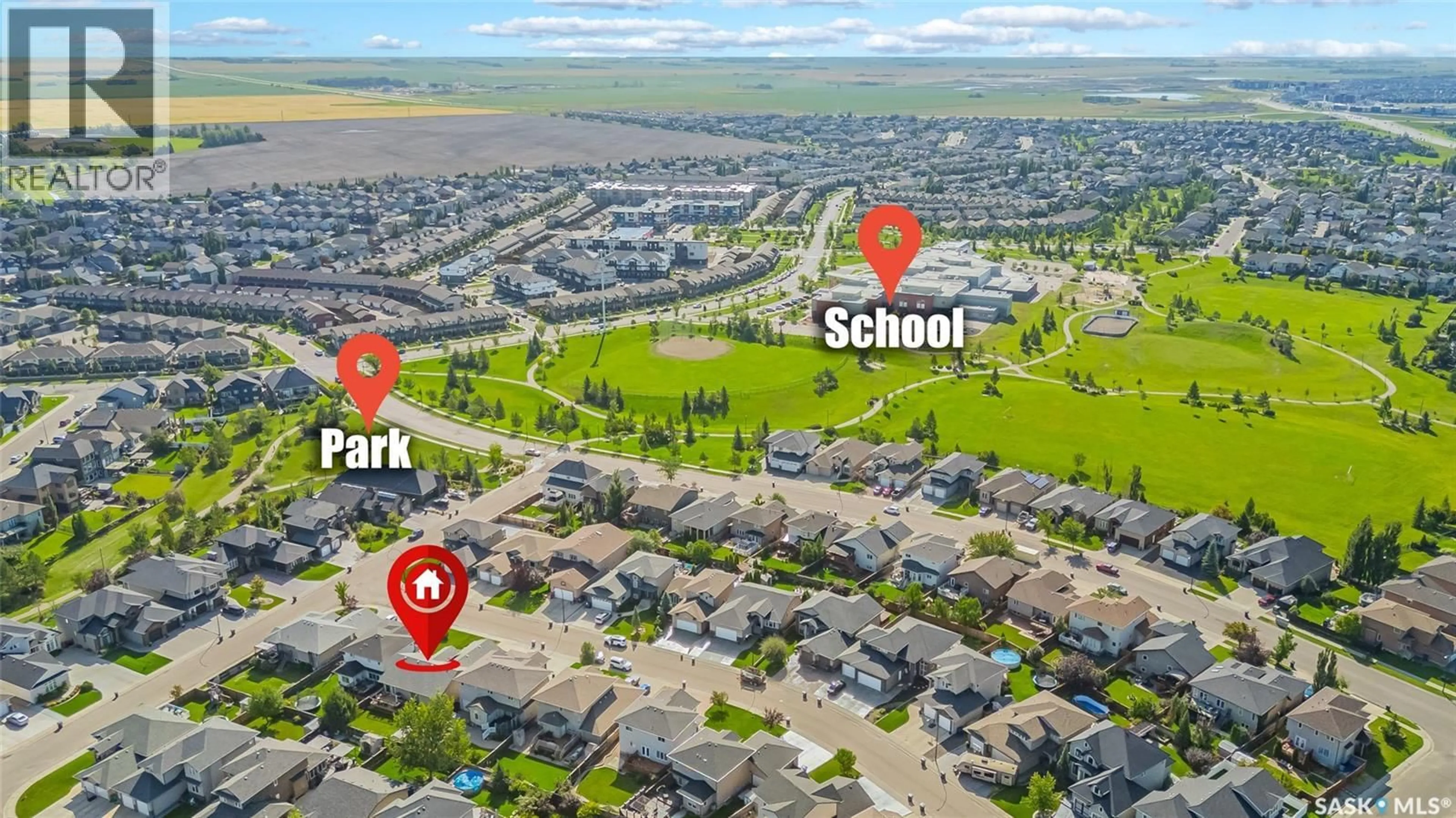 A pic from outside/outdoor area/front of a property/back of a property/a pic from drone, street for 235 WATERS LANE, Saskatoon Saskatchewan S7W0A6