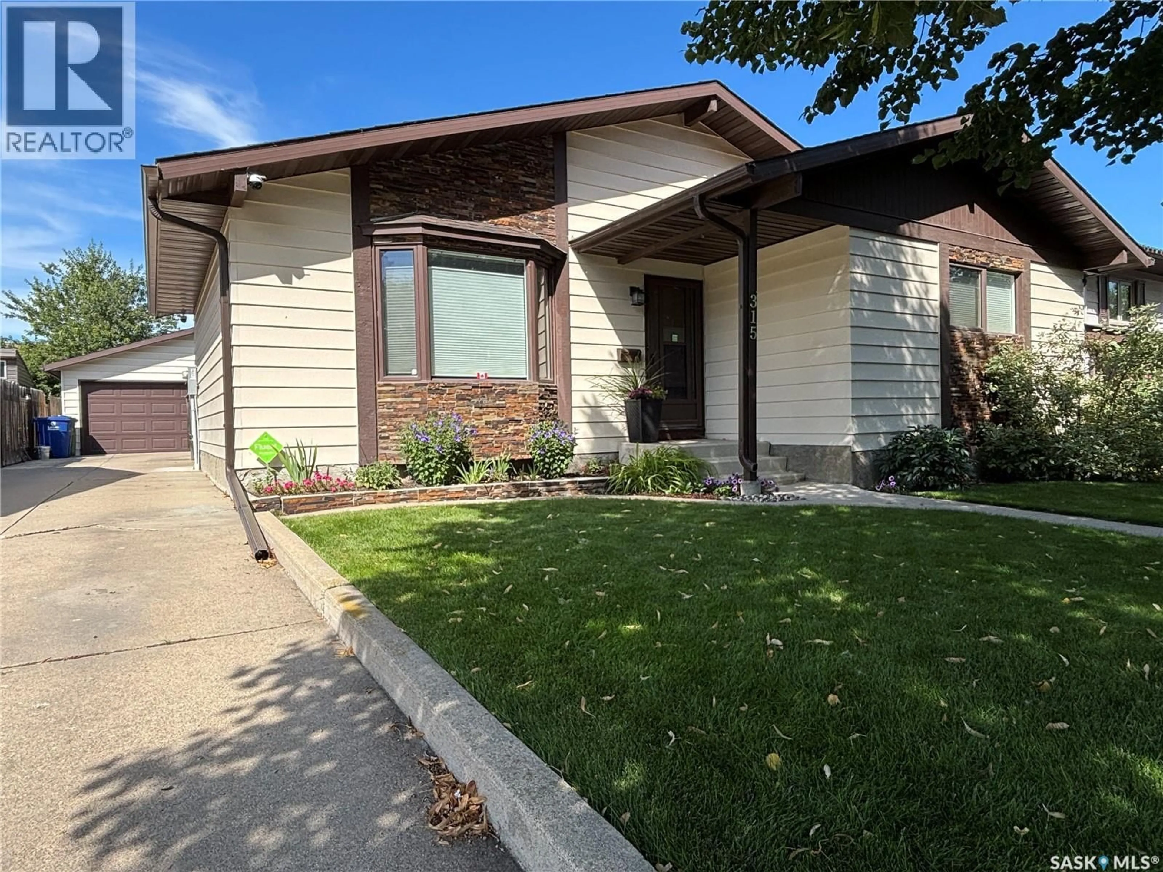 Home with vinyl exterior material, street for 315 BALL CRESCENT, Saskatoon Saskatchewan S7K6E3
