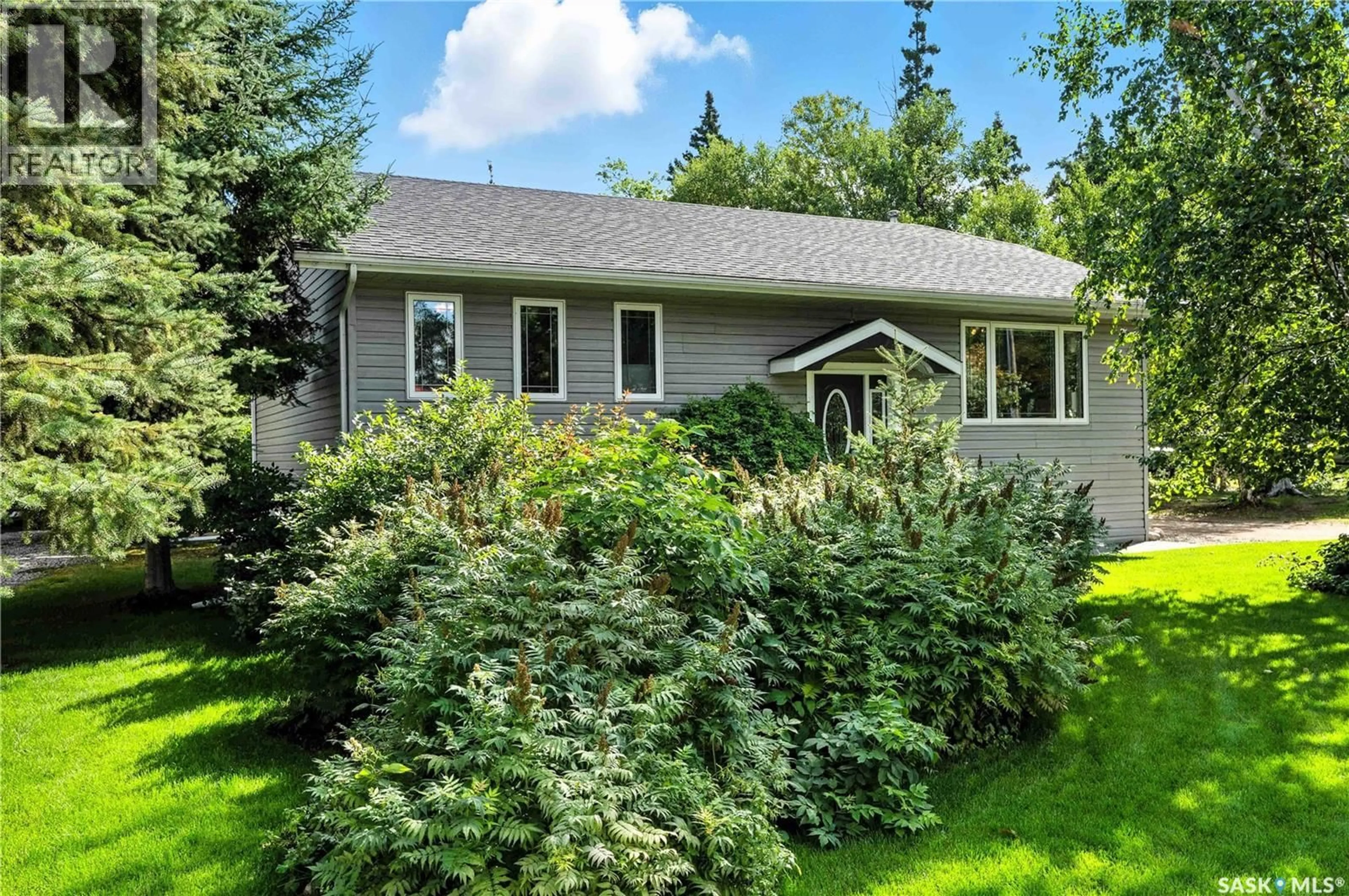 Home with vinyl exterior material, street for 315 ILA AVENUE, Lakeland Rm No. 521 Saskatchewan S0J0N0