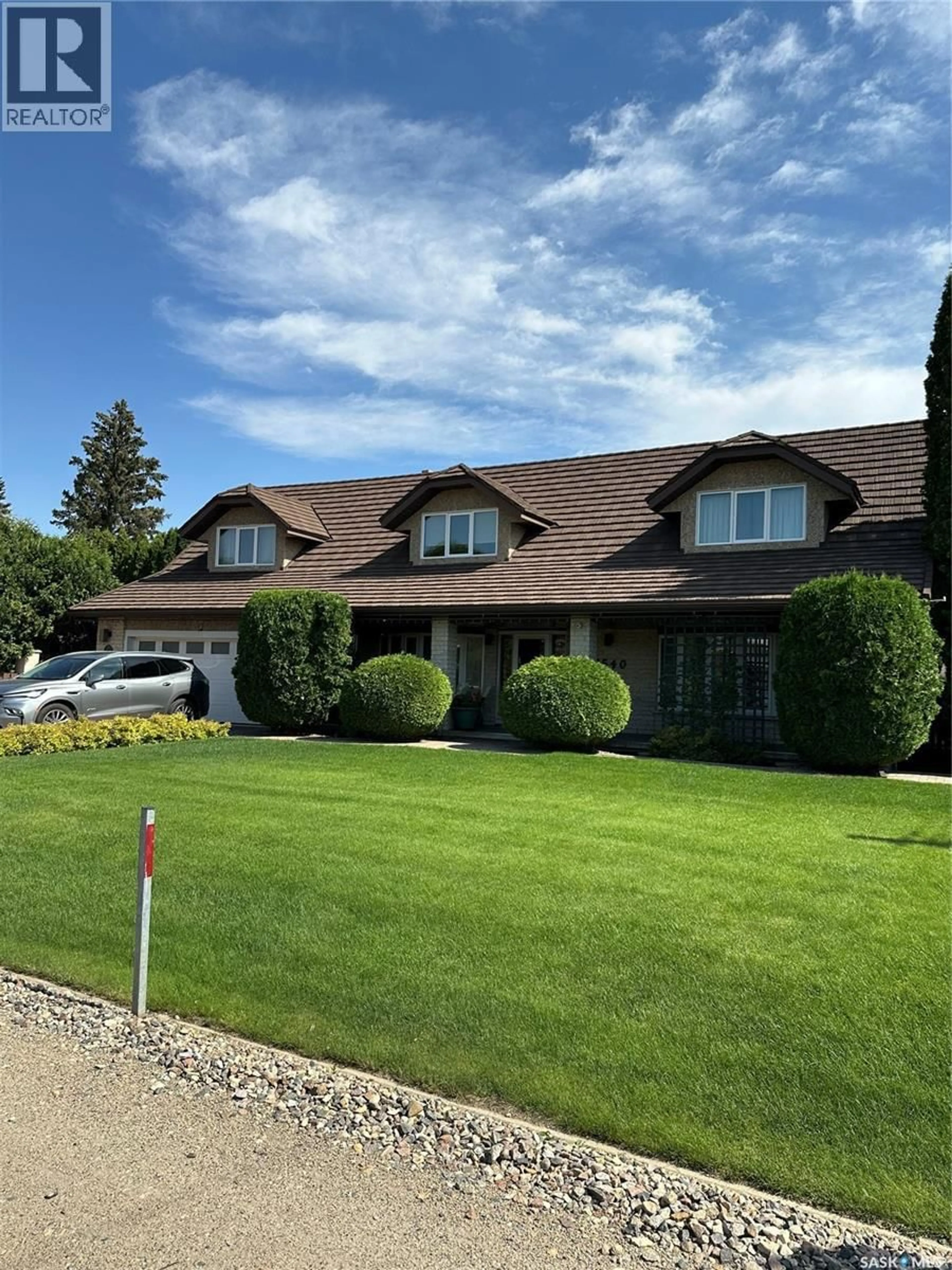 Home with vinyl exterior material, street for 1540 CRERAR DRIVE, Saskatoon Saskatchewan S7M5K7