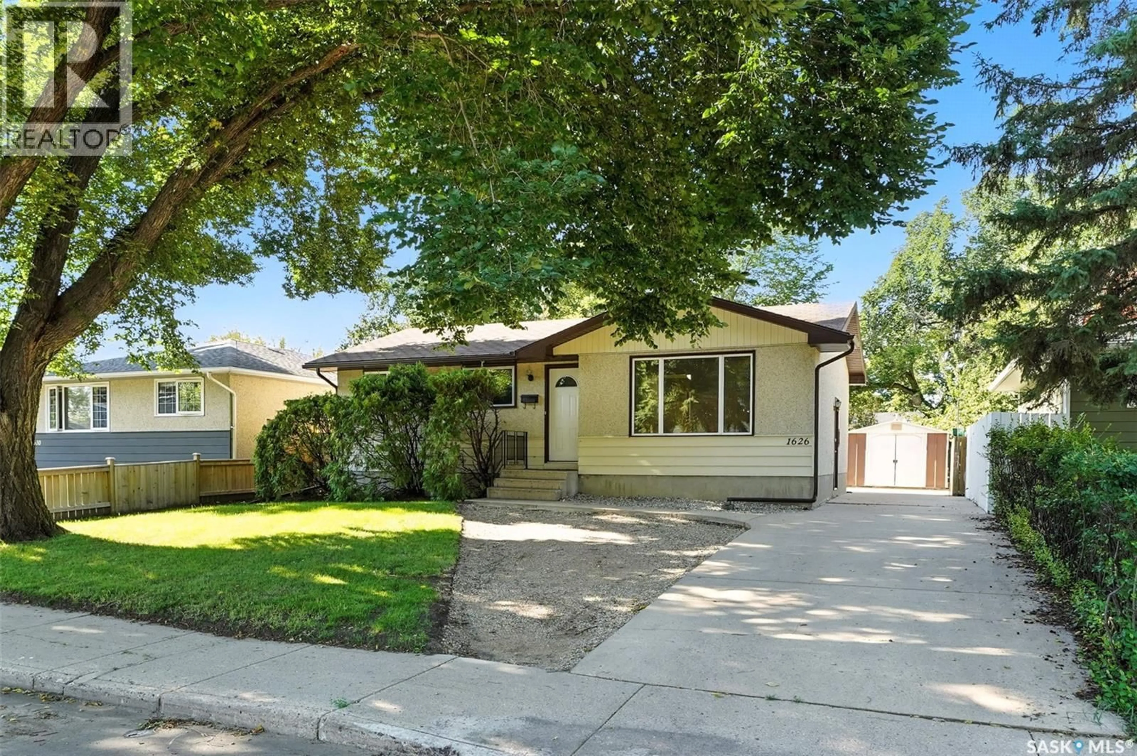 Home with vinyl exterior material, street for 1626 EARLY DRIVE, Saskatoon Saskatchewan S7H3K3