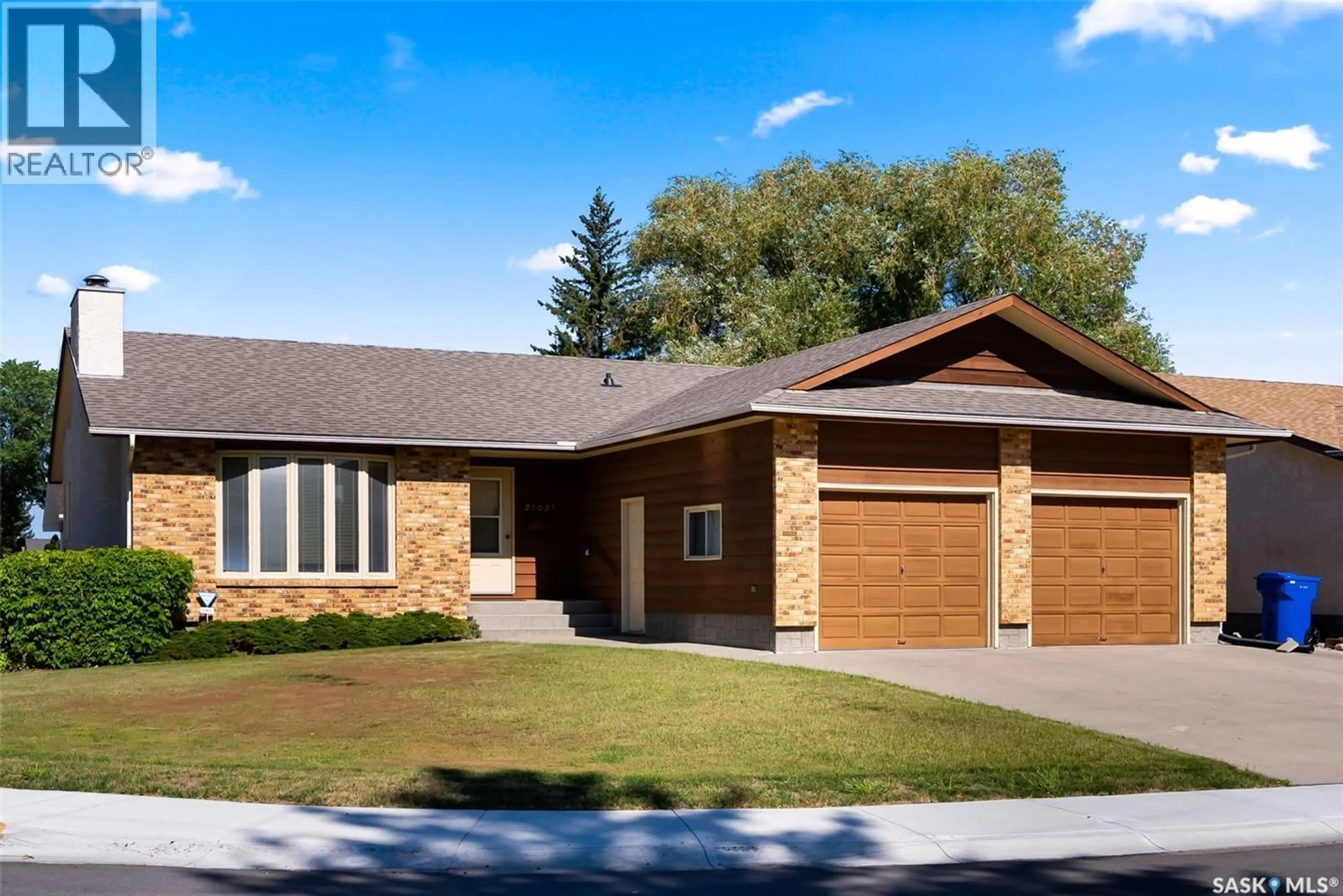 Home with brick exterior material, street for 2102 HANOVER CRESCENT, Regina Saskatchewan S4V0Z6