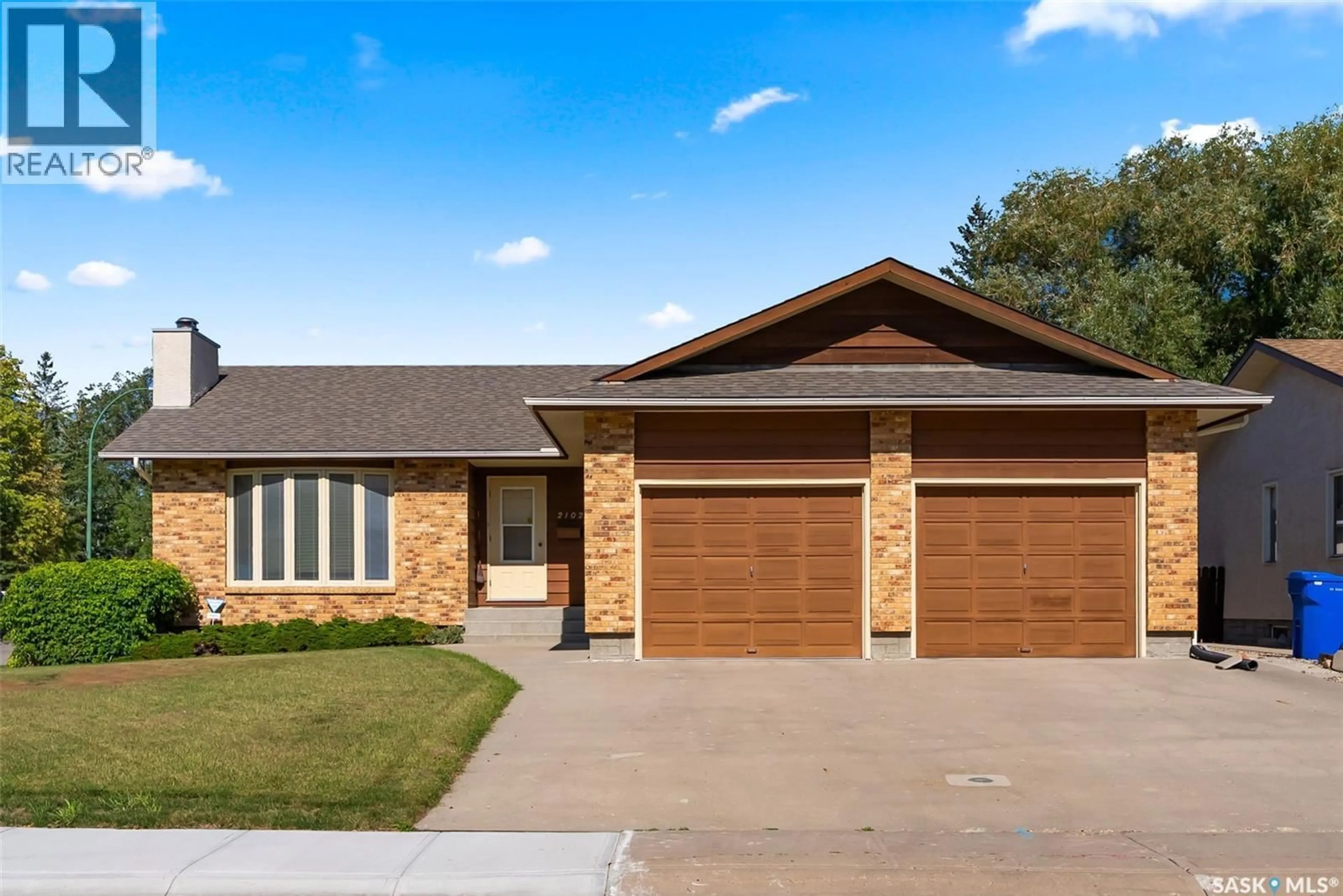 Home with brick exterior material, street for 2102 HANOVER CRESCENT, Regina Saskatchewan S4V0Z6