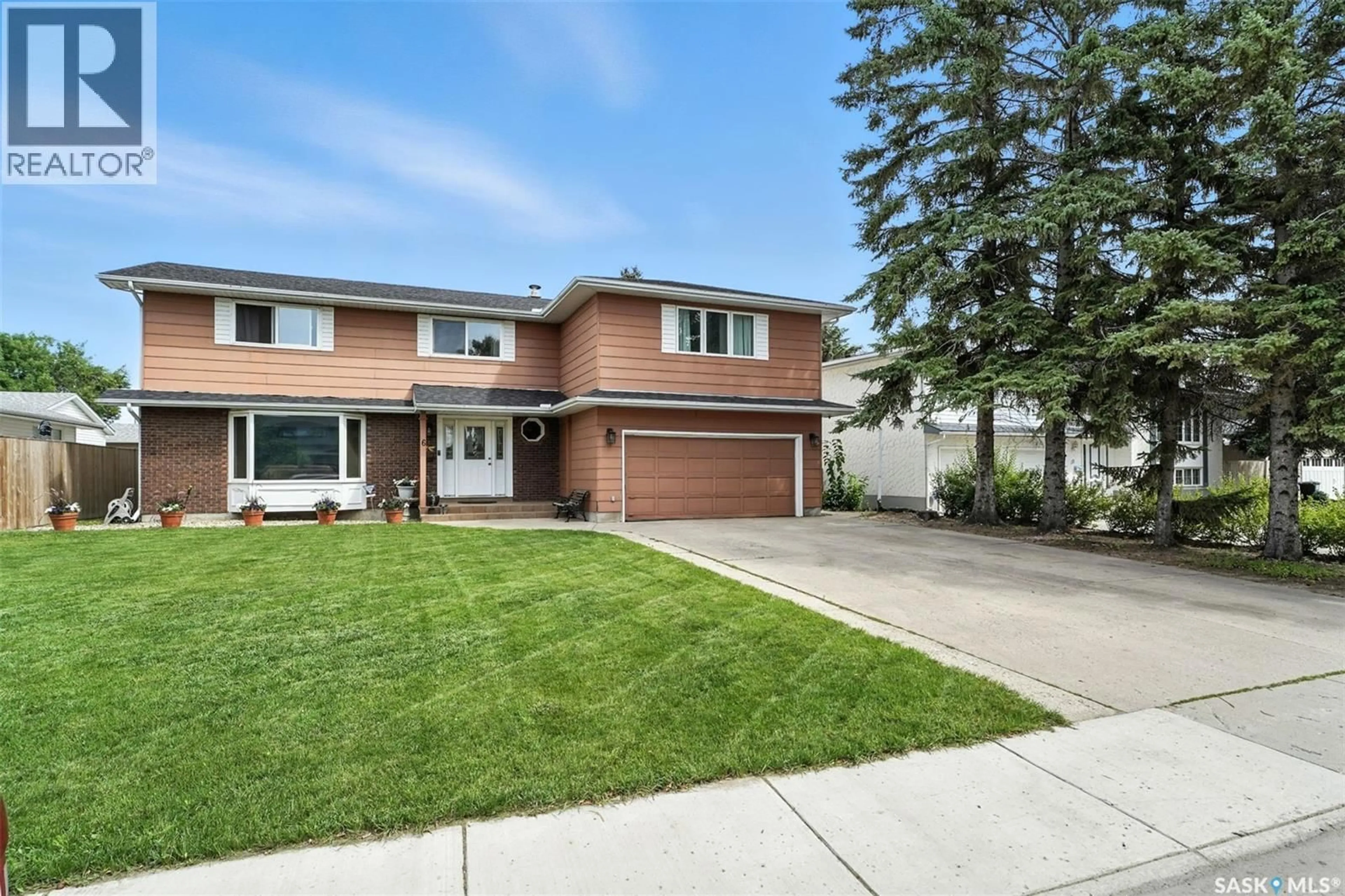 Home with brick exterior material, street for 6 CAPILANO DRIVE, Saskatoon Saskatchewan S7K4A5