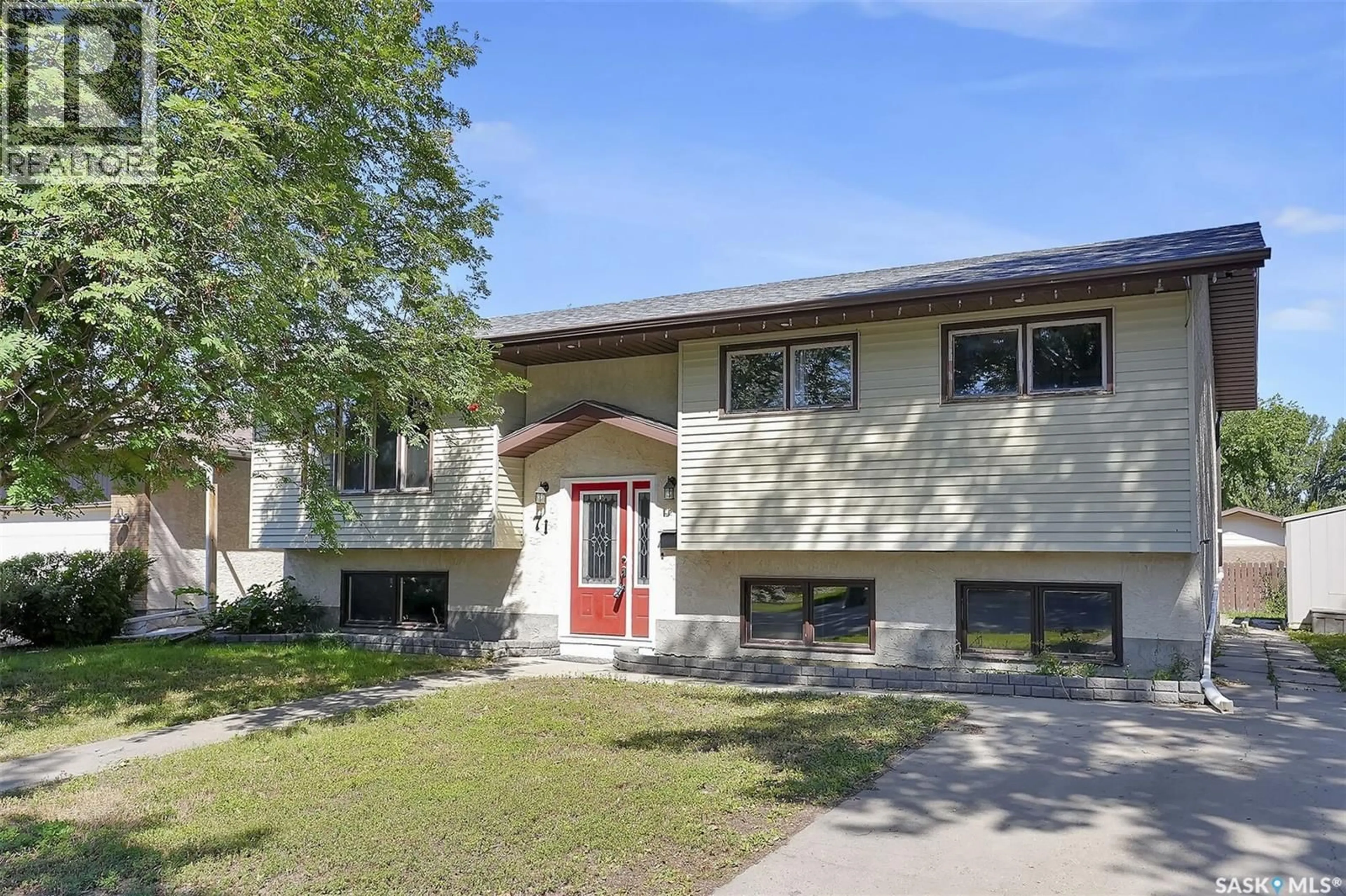 Home with vinyl exterior material, street for 71 RENDEK CRESCENT, Regina Saskatchewan S4X2V2