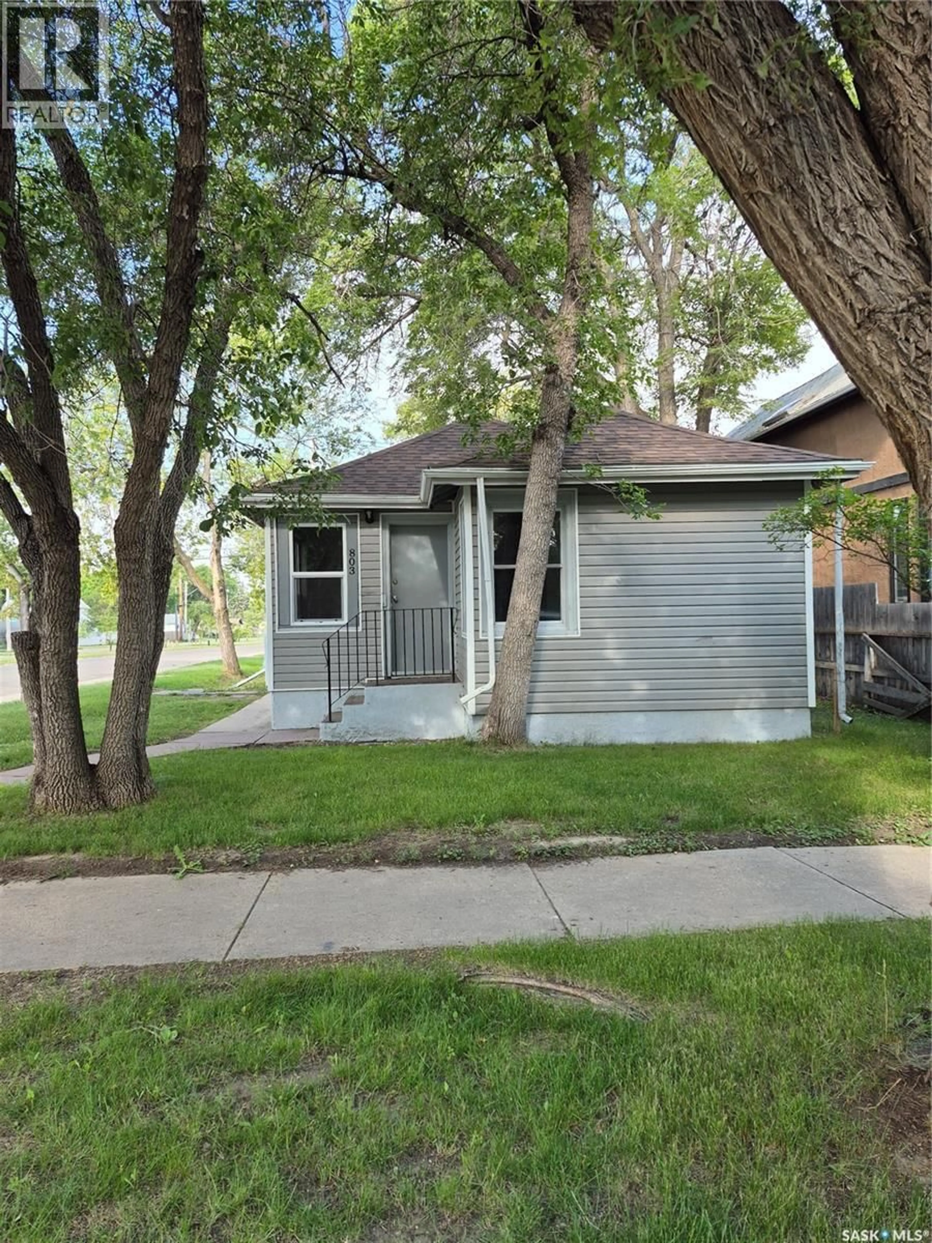 Home with vinyl exterior material, street for 803 I AVENUE, Saskatoon Saskatchewan S7L2H2