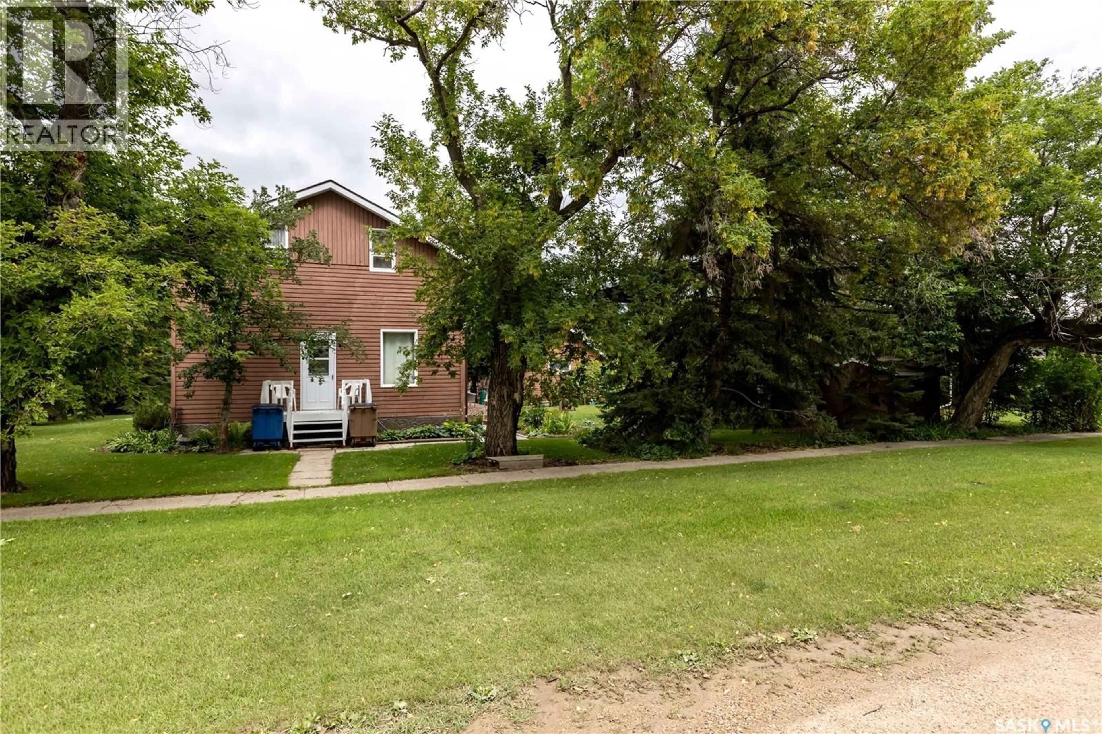 A pic from outside/outdoor area/front of a property/back of a property/a pic from drone, street for 515 STEVENS AVENUE, Birch Hills Saskatchewan S0J0G0