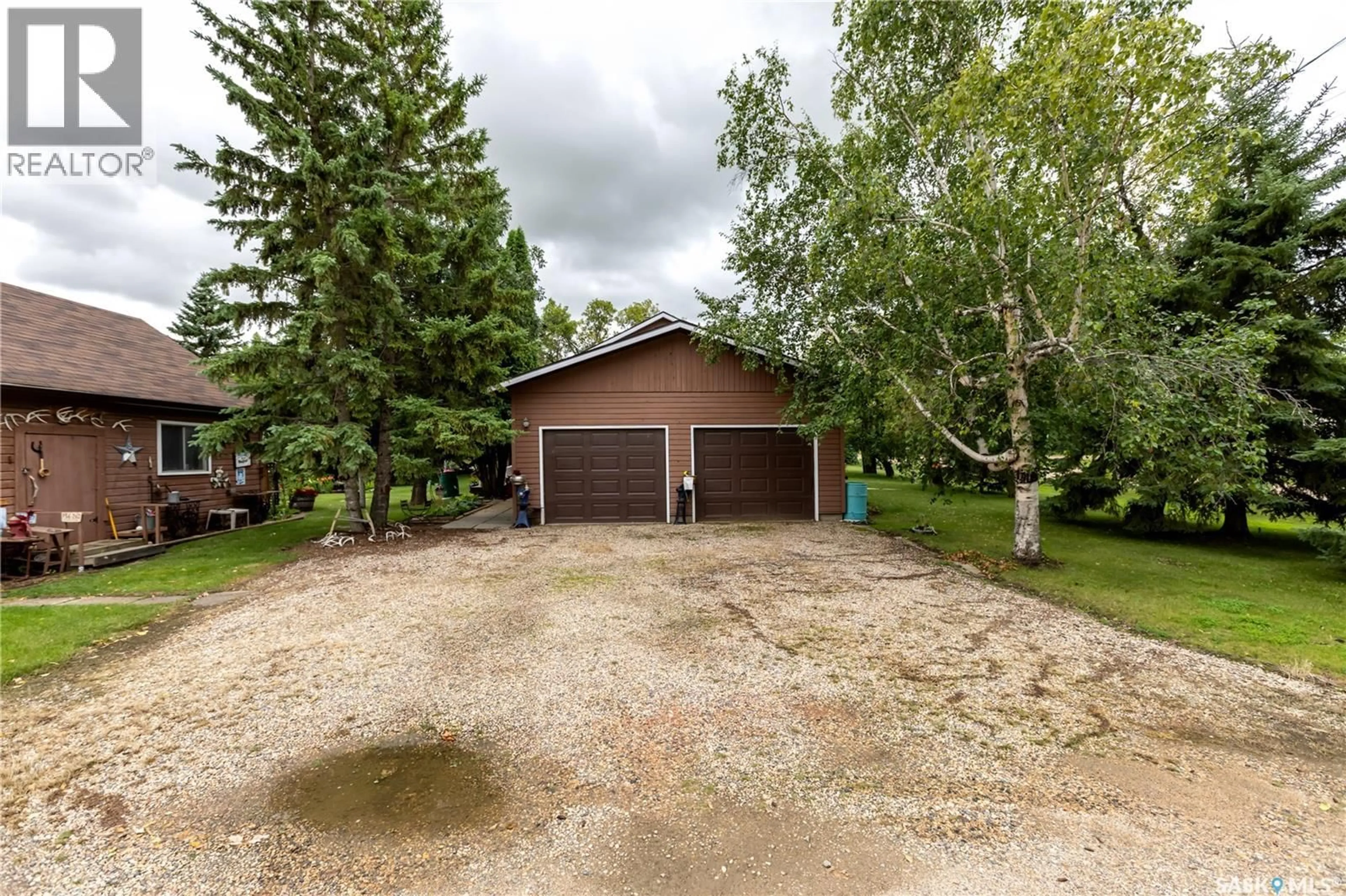 A pic from outside/outdoor area/front of a property/back of a property/a pic from drone, street for 515 STEVENS AVENUE, Birch Hills Saskatchewan S0J0G0