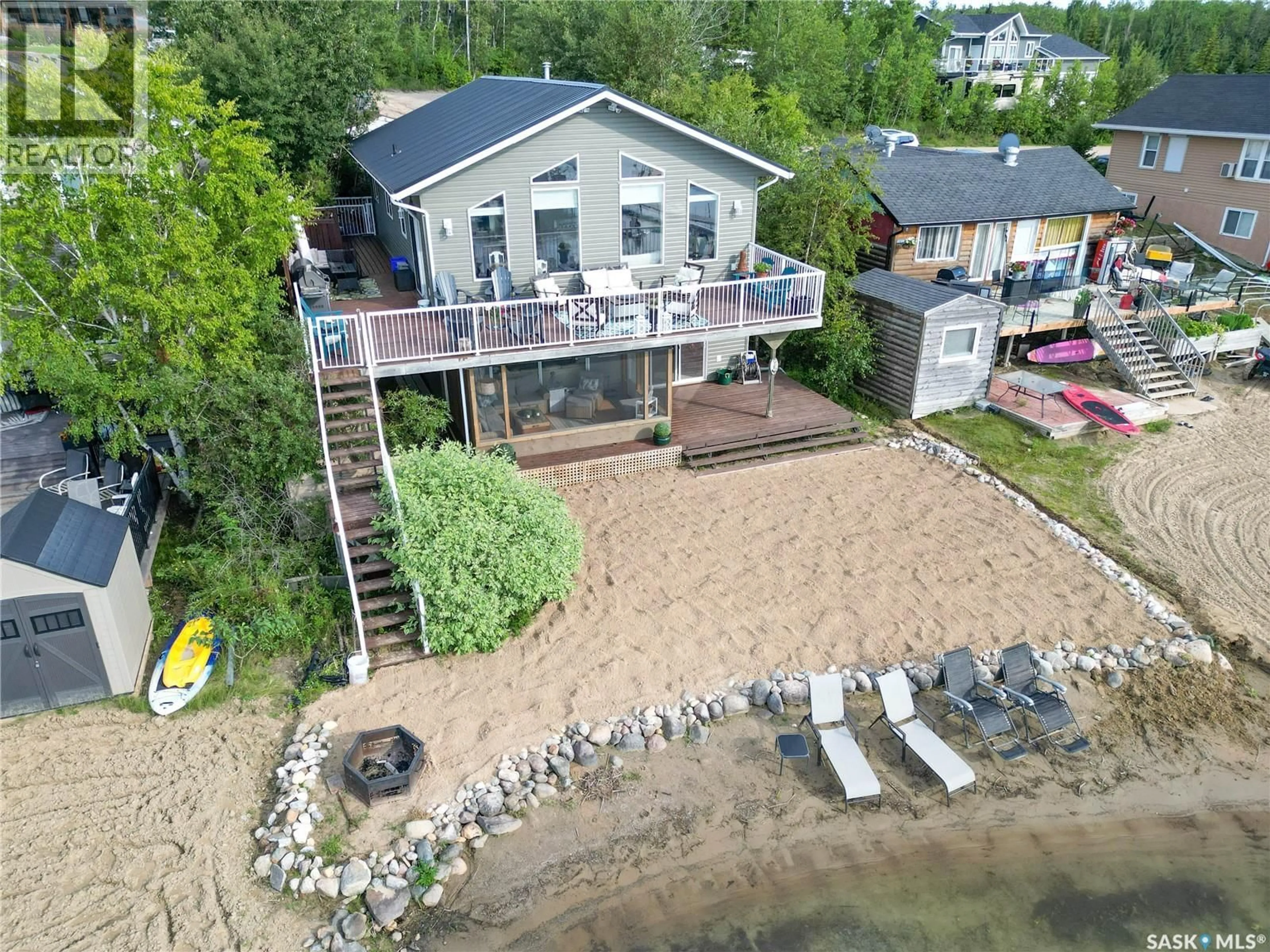 A pic from outside/outdoor area/front of a property/back of a property/a pic from drone, water/lake/river/ocean view for 108 JACOBSON DRIVE, Christopher Lake Saskatchewan S0J0N0